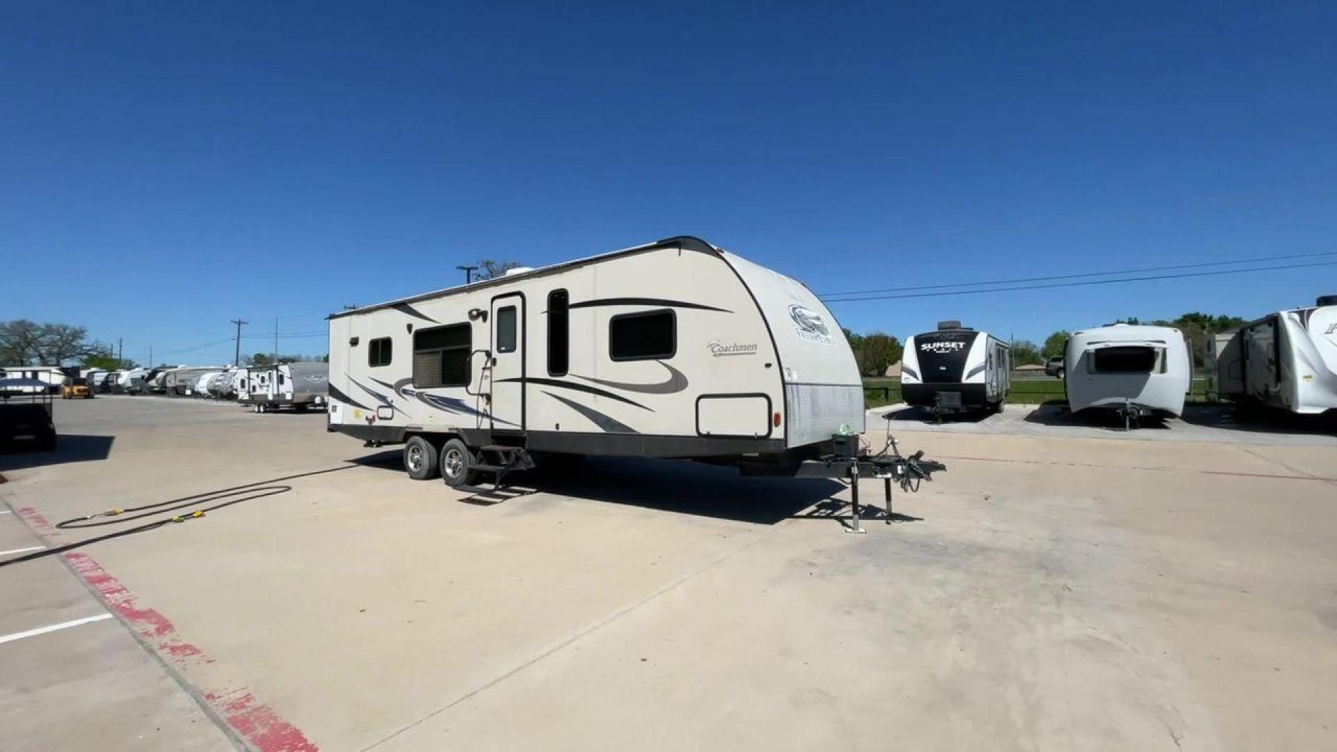 2015 WHITE COACHMEN FREEDOM EXPRESS 305R (5ZT2FEWB3FA) , Length: 34.5 ft | Dry Weight: 6,199 lbs | Gross Weight: 9,500 lbs | Slides: 2 transmission, located at 4319 N Main Street, Cleburne, TX, 76033, (817) 221-0660, 32.435829, -97.384178 - The 2015 Coachmen Freedom Express 305RKDS provides a large and comfortable traveling experience, ideal for people seeking adventure on the road. This travel trailer offers a generous amount of living space while still being easy to maneuver. It measures 34.5 feet in length and has a dry weight of 6, - Photo#3