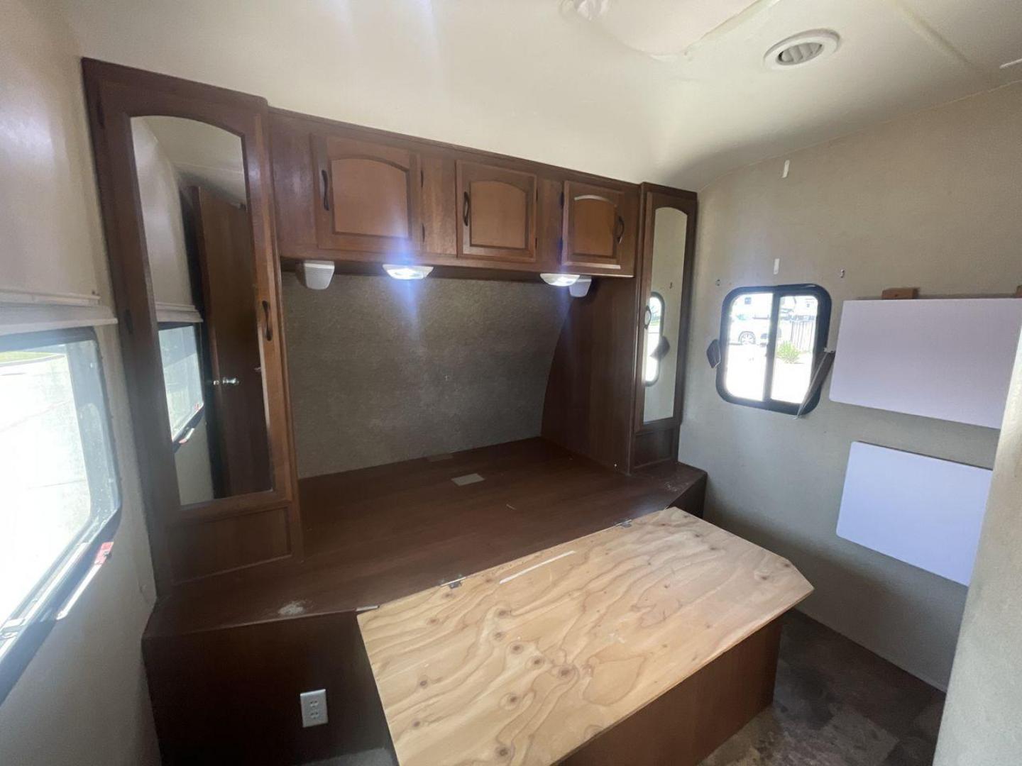 2015 TAN COACHMEN FREEDOM EXPRESS 320D (5ZT2FEXB6FA) , Length: 36.92 ft | Dry Weight: 7,374 lbs | Gross Weight: 10,700 lbs | Slides: 3 transmission, located at 4319 N Main Street, Cleburne, TX, 76033, (817) 221-0660, 32.435829, -97.384178 - The 2015 Coachmen Freedom Express 320BHDS travel trailer offers unsurpassed independence and comfort. With a length of 36.92 feet and three slides, this trailer provides ample living space for your entire family or company. Its aluminum body and fiberglass sidewalls are both robust and lightweight, - Photo#16