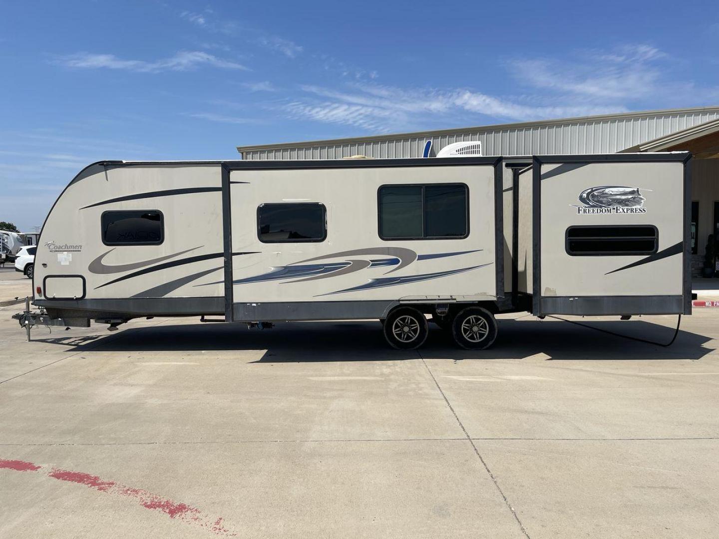 2015 TAN COACHMEN FREEDOM EXPRESS 320D (5ZT2FEXB6FA) , Length: 36.92 ft | Dry Weight: 7,374 lbs | Gross Weight: 10,700 lbs | Slides: 3 transmission, located at 4319 N Main Street, Cleburne, TX, 76033, (817) 221-0660, 32.435829, -97.384178 - The 2015 Coachmen Freedom Express 320BHDS travel trailer offers unsurpassed independence and comfort. With a length of 36.92 feet and three slides, this trailer provides ample living space for your entire family or company. Its aluminum body and fiberglass sidewalls are both robust and lightweight, - Photo#23