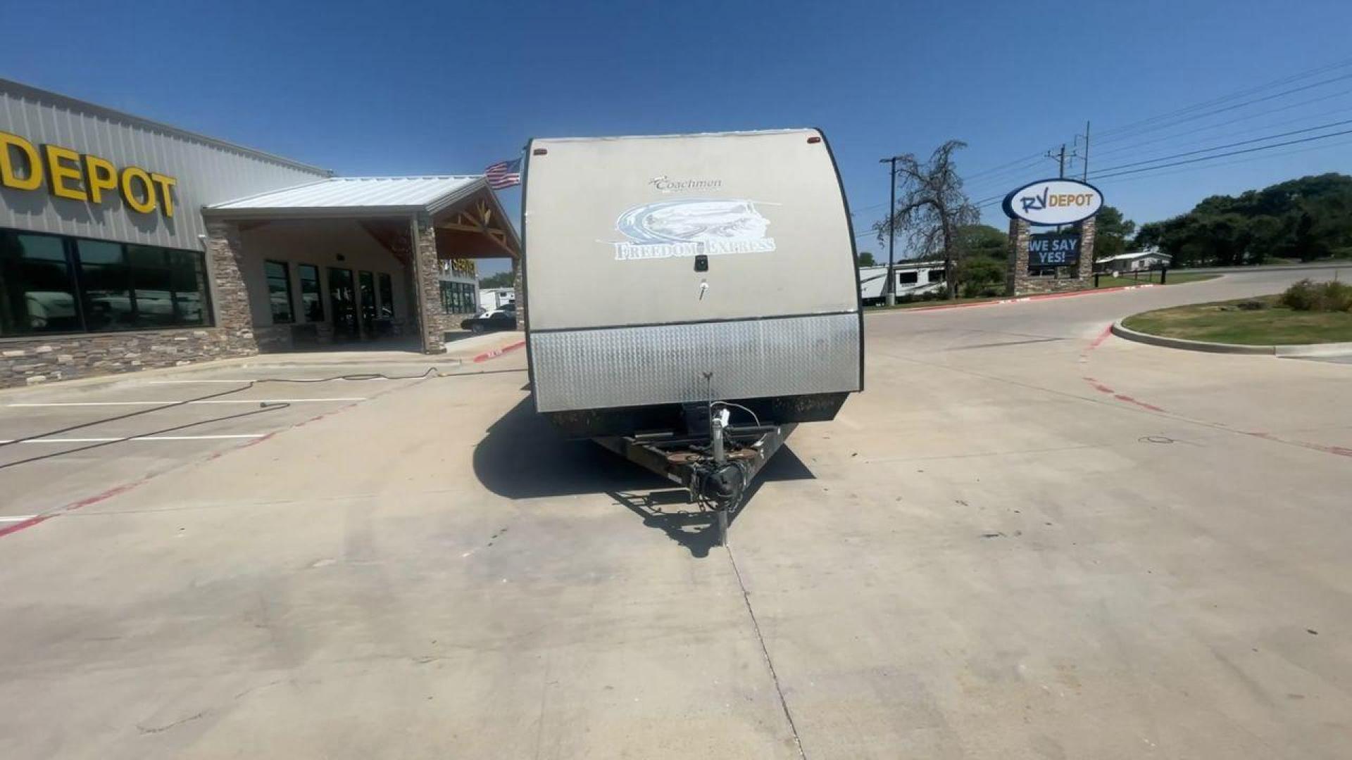 2015 TAN COACHMEN FREEDOM EXPRESS 320D (5ZT2FEXB6FA) , Length: 36.92 ft | Dry Weight: 7,374 lbs | Gross Weight: 10,700 lbs | Slides: 3 transmission, located at 4319 N Main Street, Cleburne, TX, 76033, (817) 221-0660, 32.435829, -97.384178 - The 2015 Coachmen Freedom Express 320BHDS travel trailer offers unsurpassed independence and comfort. With a length of 36.92 feet and three slides, this trailer provides ample living space for your entire family or company. Its aluminum body and fiberglass sidewalls are both robust and lightweight, - Photo#4