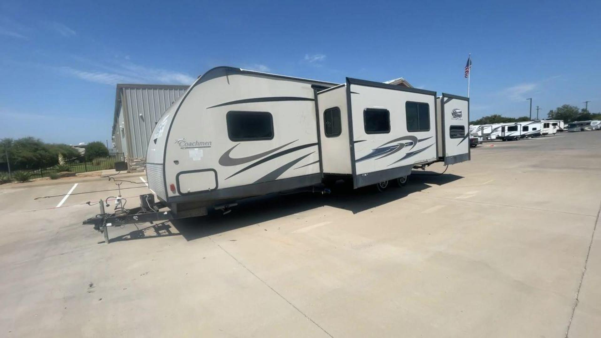 2015 TAN COACHMEN FREEDOM EXPRESS 320D (5ZT2FEXB6FA) , Length: 36.92 ft | Dry Weight: 7,374 lbs | Gross Weight: 10,700 lbs | Slides: 3 transmission, located at 4319 N Main Street, Cleburne, TX, 76033, (817) 221-0660, 32.435829, -97.384178 - The 2015 Coachmen Freedom Express 320BHDS travel trailer offers unsurpassed independence and comfort. With a length of 36.92 feet and three slides, this trailer provides ample living space for your entire family or company. Its aluminum body and fiberglass sidewalls are both robust and lightweight, - Photo#5