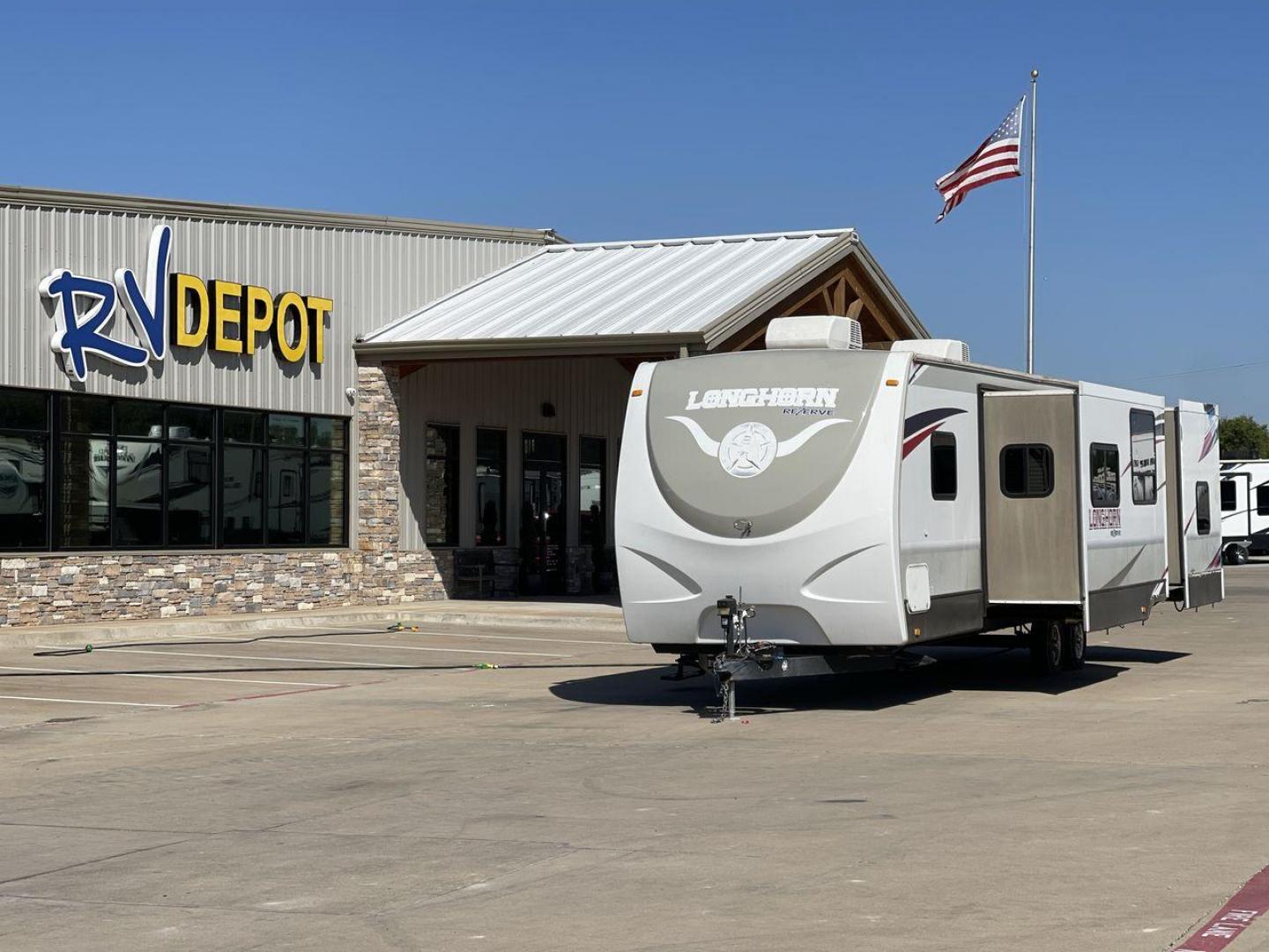 2015 CROSSROADS LONGHORN 31SB (4V0TC3124FE) , Length: 35.5 ft. | Dry Weight: 7,875 lbs. | Gross Weight: 9,671 lbs. | Slides: 2 transmission, located at 4319 N Main Street, Cleburne, TX, 76033, (817) 221-0660, 32.435829, -97.384178 - The 2015 Crossroads Longhorn 31SB is a well-crafted travel trailer with thoughtful design features and ample space, making it a great choice for families or groups looking for comfort on the road. The exterior of the Crossroads Longhorn 31SB is sleek and modern with a white body and tasteful accents - Photo#0