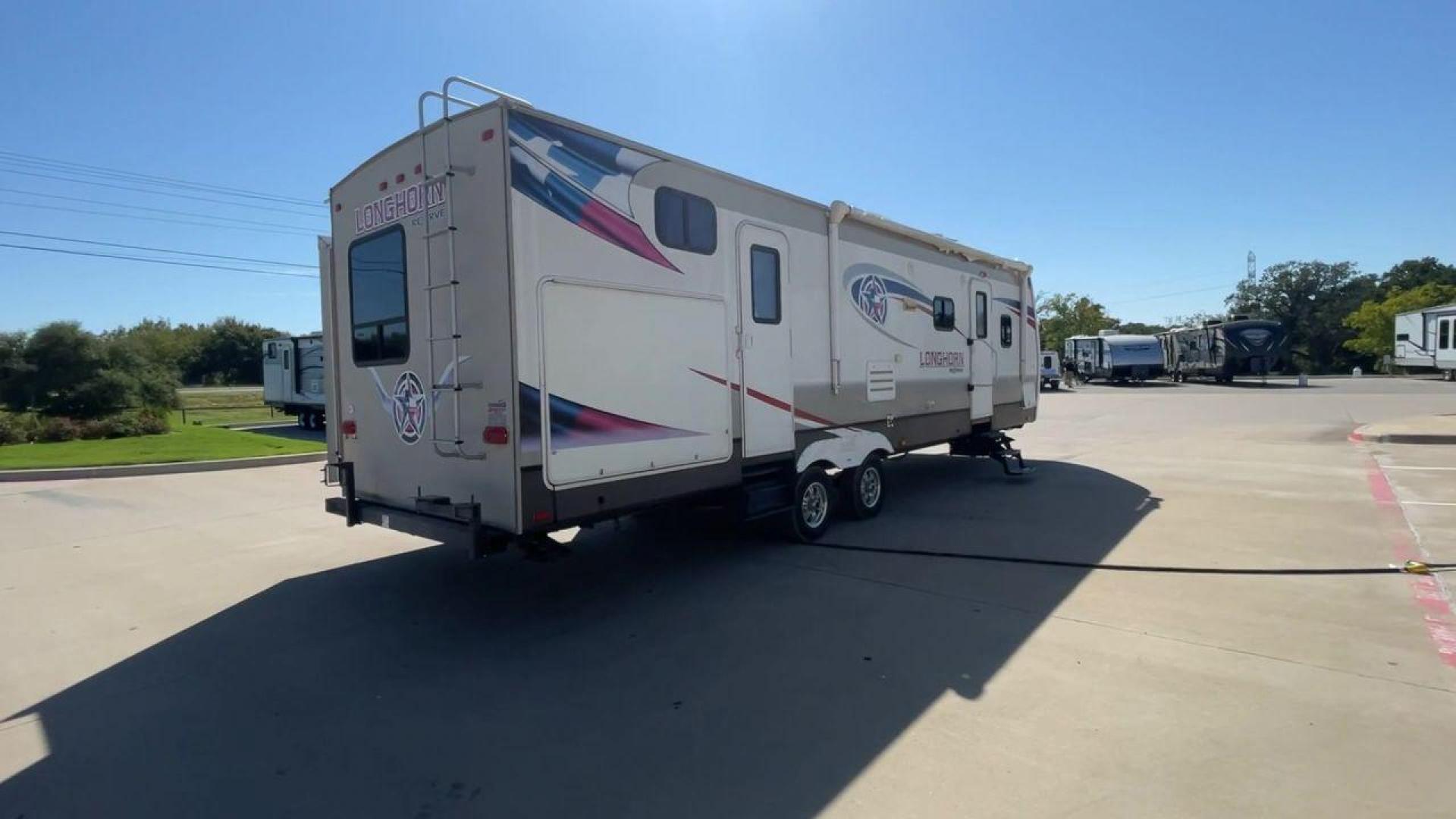 2015 CROSSROADS LONGHORN 31SB (4V0TC3124FE) , Length: 35.5 ft. | Dry Weight: 7,875 lbs. | Gross Weight: 9,671 lbs. | Slides: 2 transmission, located at 4319 N Main Street, Cleburne, TX, 76033, (817) 221-0660, 32.435829, -97.384178 - The 2015 Crossroads Longhorn 31SB is a well-crafted travel trailer with thoughtful design features and ample space, making it a great choice for families or groups looking for comfort on the road. The exterior of the Crossroads Longhorn 31SB is sleek and modern with a white body and tasteful accents - Photo#1