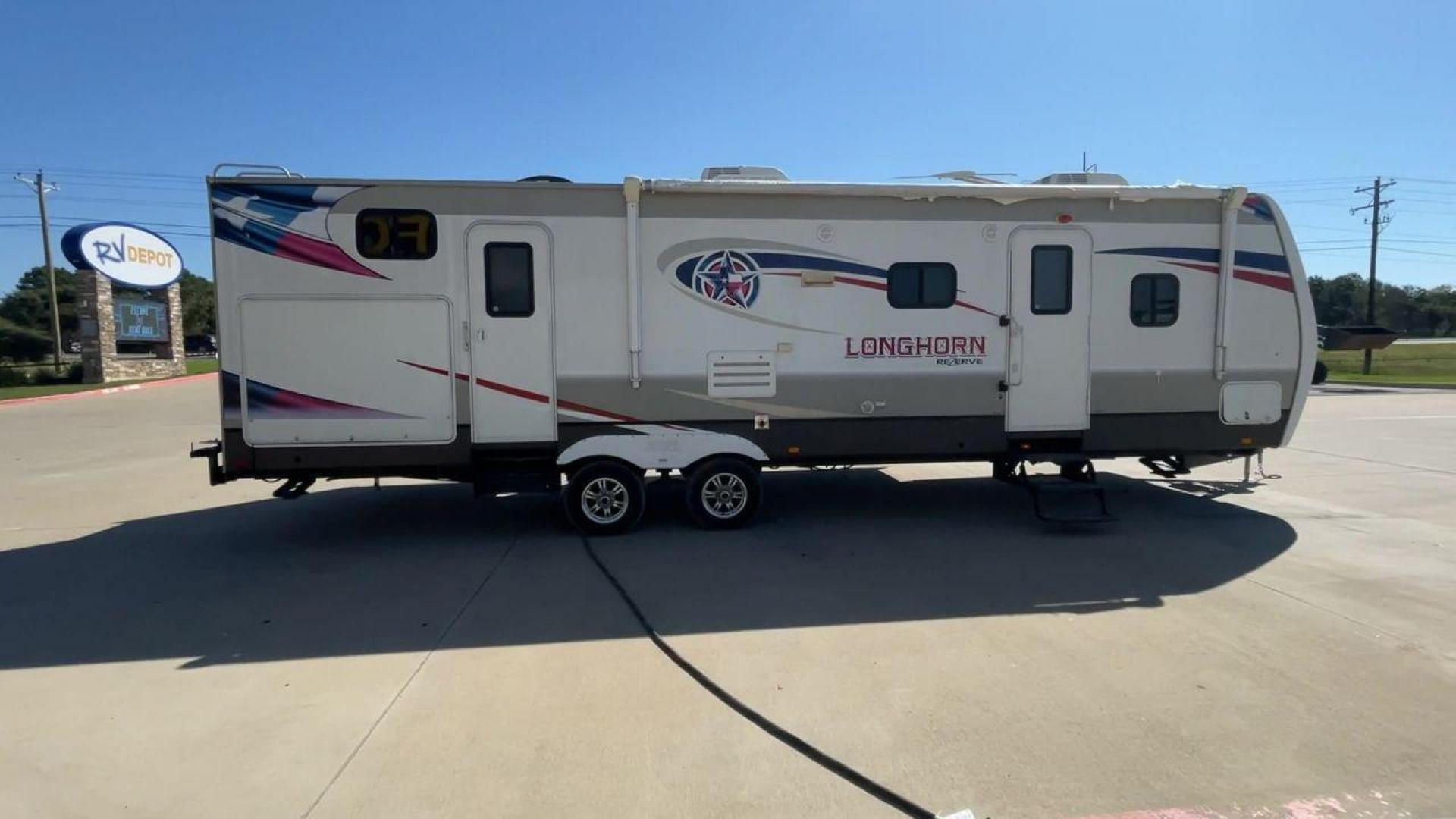 2015 CROSSROADS LONGHORN 31SB (4V0TC3124FE) , Length: 35.5 ft. | Dry Weight: 7,875 lbs. | Gross Weight: 9,671 lbs. | Slides: 2 transmission, located at 4319 N Main Street, Cleburne, TX, 76033, (817) 221-0660, 32.435829, -97.384178 - The 2015 Crossroads Longhorn 31SB is a well-crafted travel trailer with thoughtful design features and ample space, making it a great choice for families or groups looking for comfort on the road. The exterior of the Crossroads Longhorn 31SB is sleek and modern with a white body and tasteful accents - Photo#2