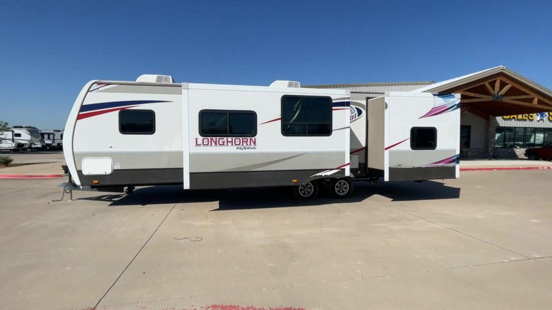 2015 CROSSROADS LONGHORN 31SB (4V0TC3124FE) , Length: 35.5 ft. | Dry Weight: 7,875 lbs. | Gross Weight: 9,671 lbs. | Slides: 2 transmission, located at 4319 N Main Street, Cleburne, TX, 76033, (817) 221-0660, 32.435829, -97.384178 - The 2015 Crossroads Longhorn 31SB is a well-crafted travel trailer with thoughtful design features and ample space, making it a great choice for families or groups looking for comfort on the road. The exterior of the Crossroads Longhorn 31SB is sleek and modern with a white body and tasteful accents - Photo#6