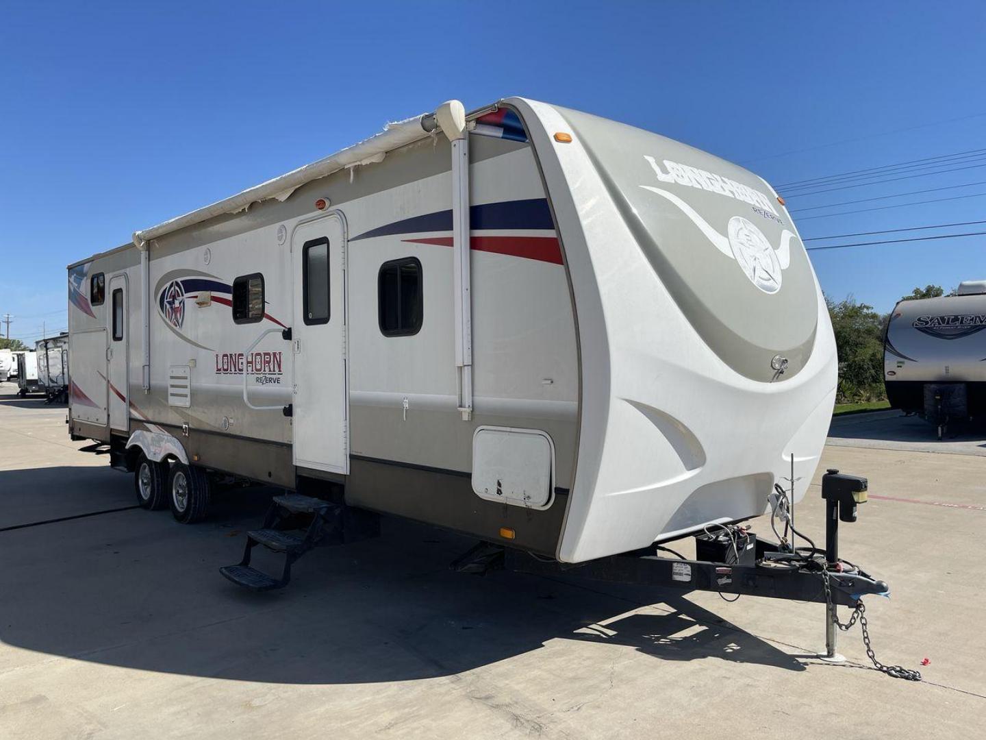 2015 CROSSROADS LONGHORN 31SB (4V0TC3124FE) , Length: 35.5 ft. | Dry Weight: 7,875 lbs. | Gross Weight: 9,671 lbs. | Slides: 2 transmission, located at 4319 N Main Street, Cleburne, TX, 76033, (817) 221-0660, 32.435829, -97.384178 - The 2015 Crossroads Longhorn 31SB is a well-crafted travel trailer with thoughtful design features and ample space, making it a great choice for families or groups looking for comfort on the road. The exterior of the Crossroads Longhorn 31SB is sleek and modern with a white body and tasteful accents - Photo#20