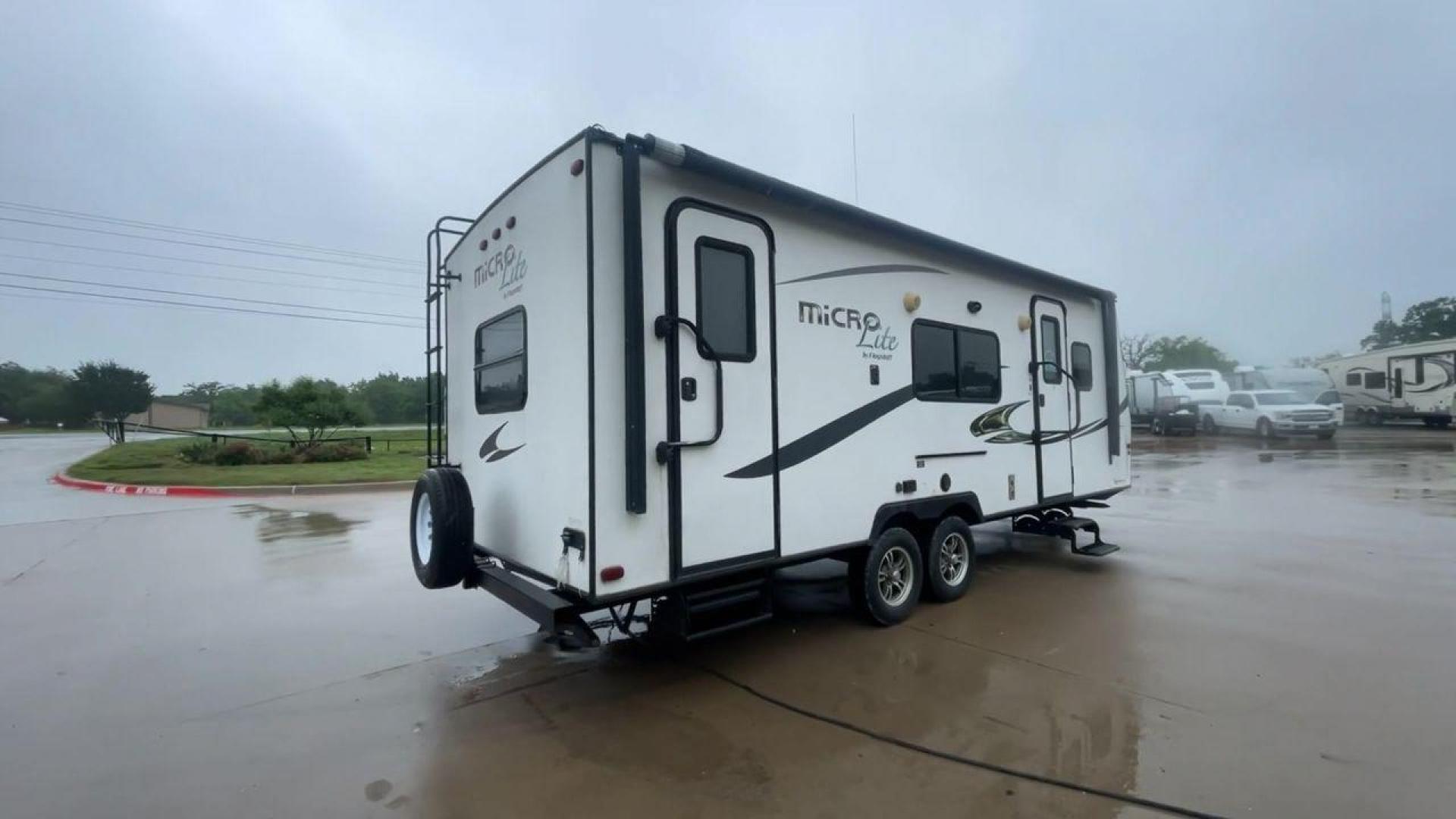 2015 FOREST RIVER FLAGSTAFF 25KS (4X4TFLA23FD) , Length: 25.67 ft. | Dry Weight: 4,310 lbs. | Gross Weight: 6,538 lbs. | Slides: 1 transmission, located at 4319 N Main Street, Cleburne, TX, 76033, (817) 221-0660, 32.435829, -97.384178 - The 2015 Forest River Flagstaff 25KS is a dual-axle steel wheel set-up measuring 25.67 ft. in length. It has a dry weight of 4,310 lbs. and a GVWR of 6,538 lbs. It has 1 power slide. Its exterior comes with a power awning with LED lights underneath to light up your campsite, plus a couple of spea - Photo#1