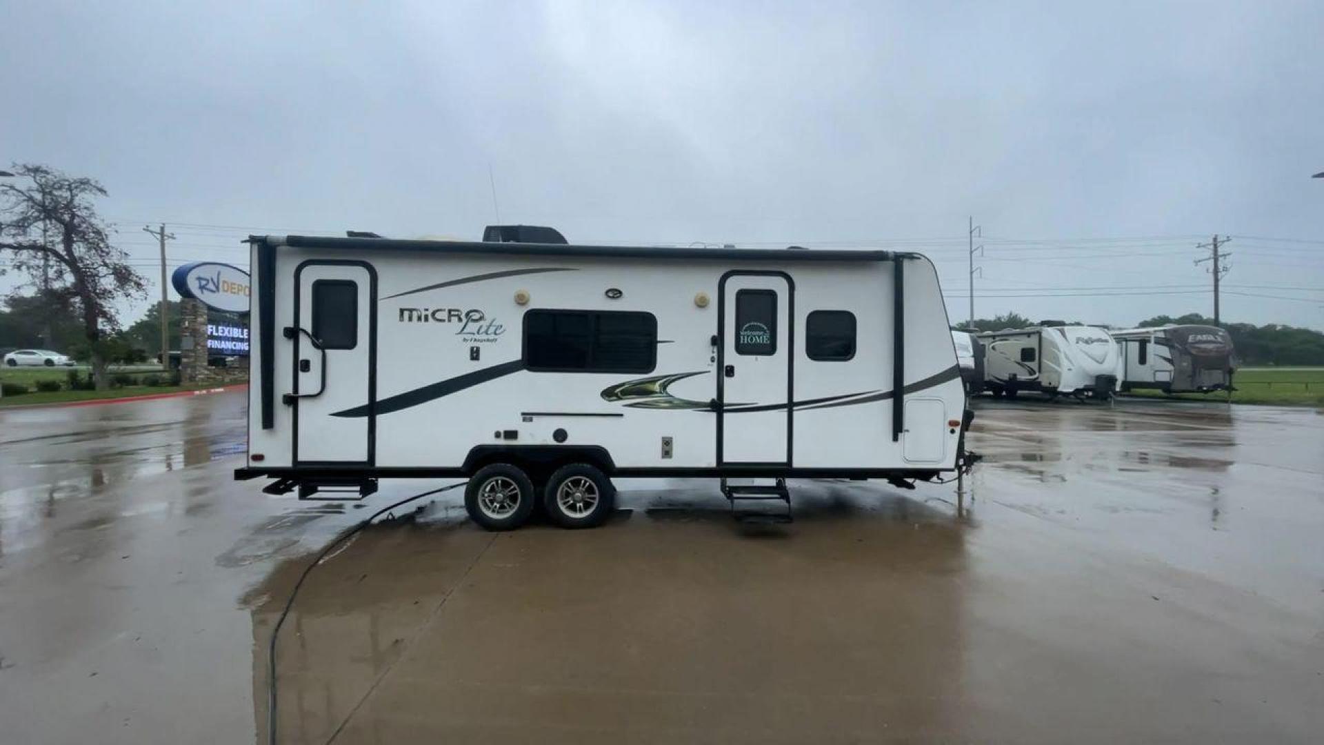 2015 FOREST RIVER FLAGSTAFF 25KS (4X4TFLA23FD) , Length: 25.67 ft. | Dry Weight: 4,310 lbs. | Gross Weight: 6,538 lbs. | Slides: 1 transmission, located at 4319 N Main Street, Cleburne, TX, 76033, (817) 221-0660, 32.435829, -97.384178 - The 2015 Forest River Flagstaff 25KS is a dual-axle steel wheel set-up measuring 25.67 ft. in length. It has a dry weight of 4,310 lbs. and a GVWR of 6,538 lbs. It has 1 power slide. Its exterior comes with a power awning with LED lights underneath to light up your campsite, plus a couple of spea - Photo#2