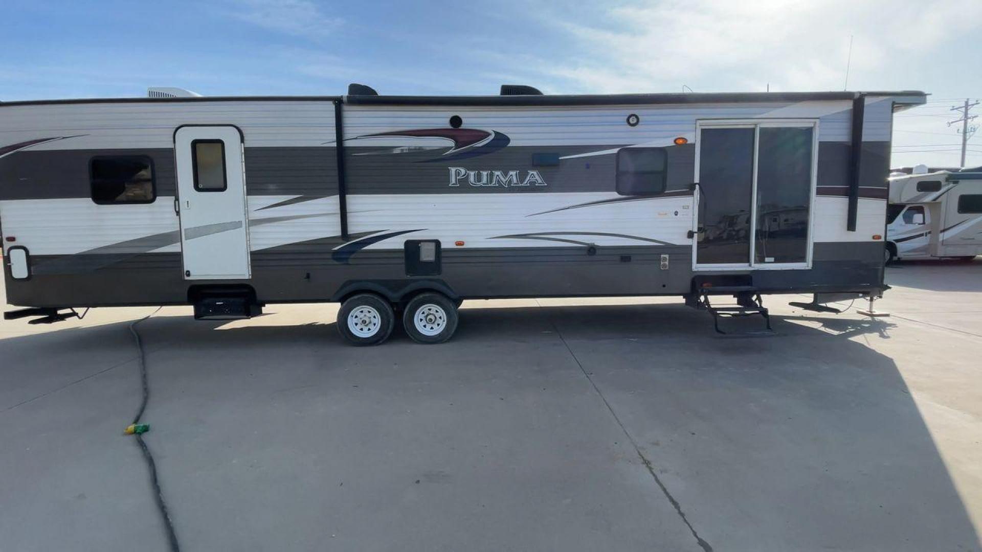 2015 FOREST RIVER PUMA 38PLF (4X4TPUP29FP) , Length: 40.83 ft. | Dry Weight: 9,565 lbs. | Gross Weight: 12,099 lbs. | Slides: 2 transmission, located at 4319 N Main Street, Cleburne, TX, 76033, (817) 221-0660, 32.435829, -97.384178 - The 2015 Forest River Puma 38PLF is a spacious destination trailer designed for those who desire the comforts of home while enjoying the great outdoors. With a residential-style layout and thoughtful features, it’s perfect for extended stays or seasonal living. This unit has a length of 40.83 ft i - Photo#2