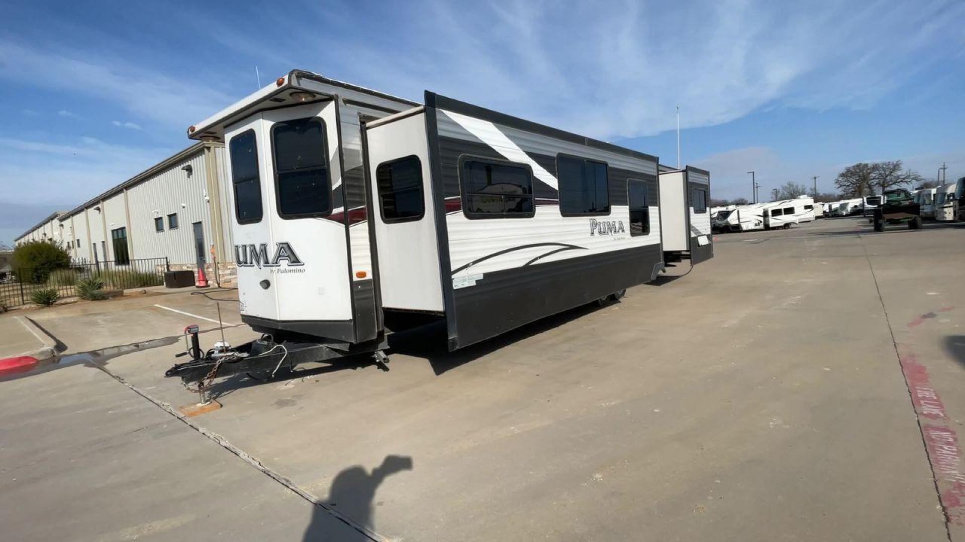 2015 FOREST RIVER PUMA 38PLF (4X4TPUP29FP) , Length: 40.83 ft. | Dry Weight: 9,565 lbs. | Gross Weight: 12,099 lbs. | Slides: 2 transmission, located at 4319 N Main Street, Cleburne, TX, 76033, (817) 221-0660, 32.435829, -97.384178 - The 2015 Forest River Puma 38PLF is a spacious destination trailer designed for those who desire the comforts of home while enjoying the great outdoors. With a residential-style layout and thoughtful features, it’s perfect for extended stays or seasonal living. This unit has a length of 40.83 ft i - Photo#5