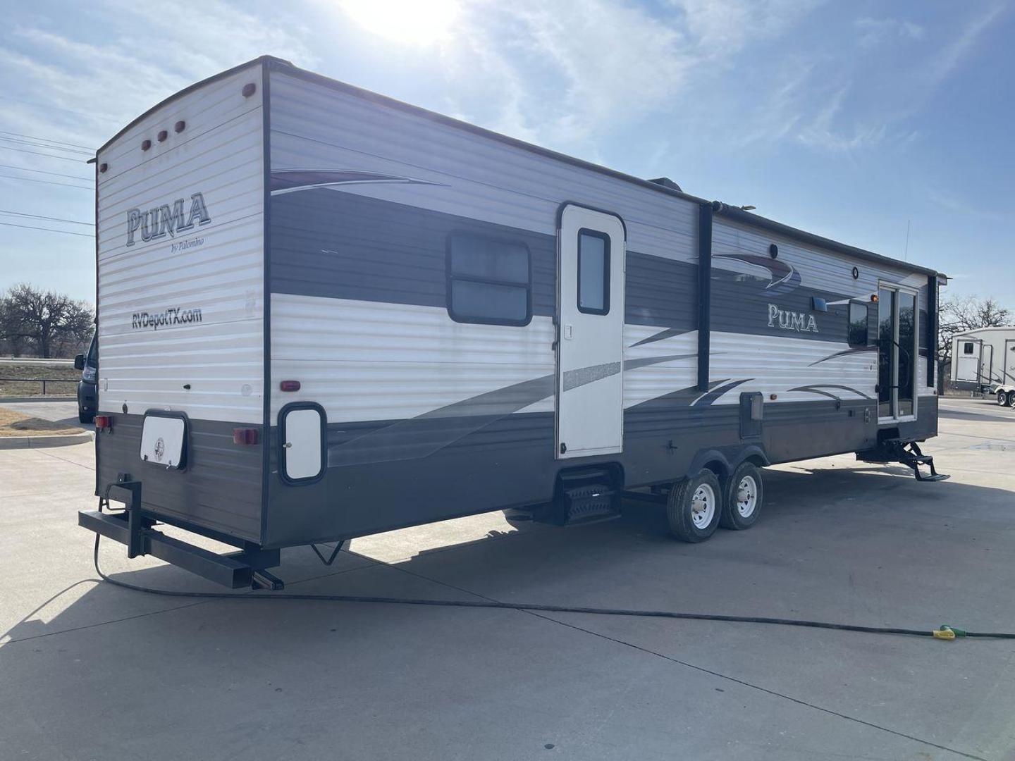 2015 FOREST RIVER PUMA 38PLF (4X4TPUP29FP) , Length: 40.83 ft. | Dry Weight: 9,565 lbs. | Gross Weight: 12,099 lbs. | Slides: 2 transmission, located at 4319 N Main Street, Cleburne, TX, 76033, (817) 221-0660, 32.435829, -97.384178 - The 2015 Forest River Puma 38PLF is a spacious destination trailer designed for those who desire the comforts of home while enjoying the great outdoors. With a residential-style layout and thoughtful features, it’s perfect for extended stays or seasonal living. This unit has a length of 40.83 ft i - Photo#24