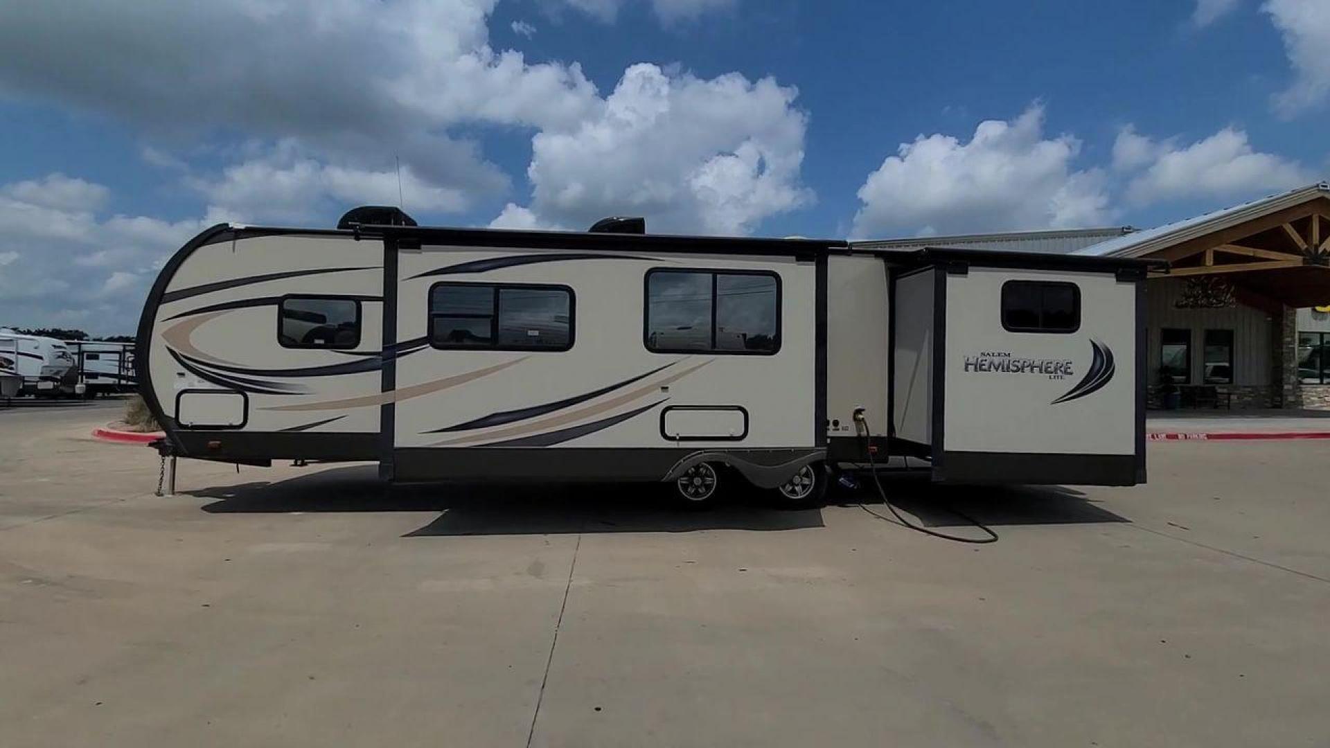 2015 FOREST RIVER SALEM 312QBUD (4X4TSBG22FU) , Length: 35.83 ft. | Dry Weight: 7,150 lbs. | Slides: 2 transmission, located at 4319 N Main Street, Cleburne, TX, 76033, (817) 221-0660, 32.435829, -97.384178 - Take advantage of the 2015 Forest River Salem 312QBUD Travel Trailer and embrace your spirit of adventure. Comfort and practicality come together in this travel trailer, which is perfect for families or parties looking for a roomy and luxurious home on wheels for amazing camping excursions. This - Photo#2