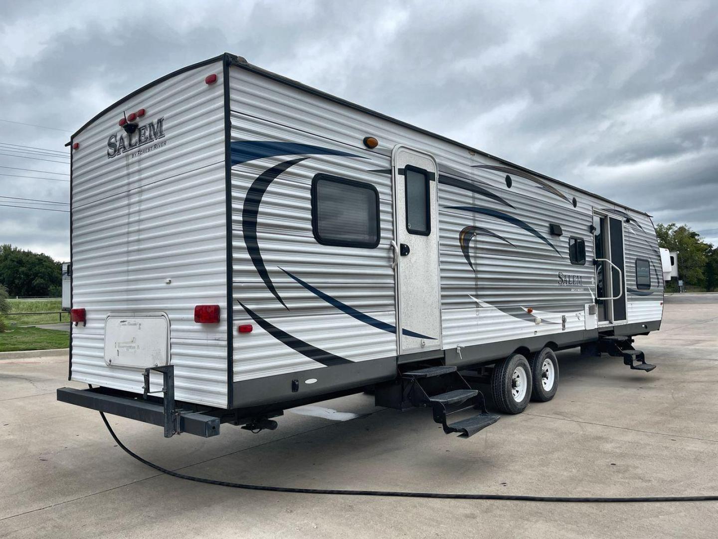 2015 FOREST RIVER SALEM 36BHBS (4X4TSMM24FA) , Length: 36.58 ft. | Dry Weight: 7,892 lbs. | Slides: 2 transmission, located at 4319 N Main Street, Cleburne, TX, 76033, (817) 221-0660, 32.435829, -97.384178 - The 2015 Forest River Salem 36BHBS is a spacious and versatile travel trailer designed for comfort and convenience during family adventures. With a length of 36.58 feet and a dry weight of 7,892 lbs., this model offers ample living space and features that make it perfect for long vacations or weeken - Photo#25