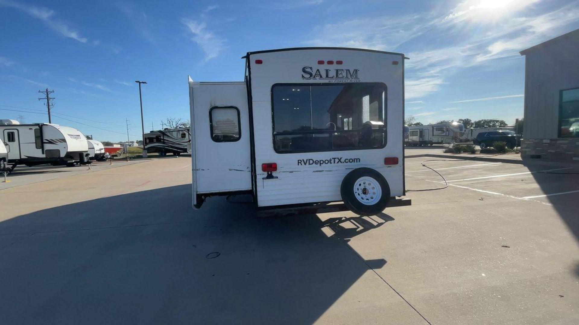 2015 GRAY FOREST RIVER SALEM 28RLDS - (4X4TSMD2XFA) , Length: 31.67 ft. | Dry Weight: 7,394 lbs. | Slides: 2 transmission, located at 4319 N Main Street, Cleburne, TX, 76033, (817) 221-0660, 32.435829, -97.384178 - RV Depot in Cleburne, TX is offering a fantastic deal on a 2015 FOREST RIVER SALEM travel trailer. Priced at just $27,995, this spacious and comfortable RV is perfect for those looking to hit the road and explore the local driving highlights around Cleburne, TX. The exterior of this travel trailer - Photo#8