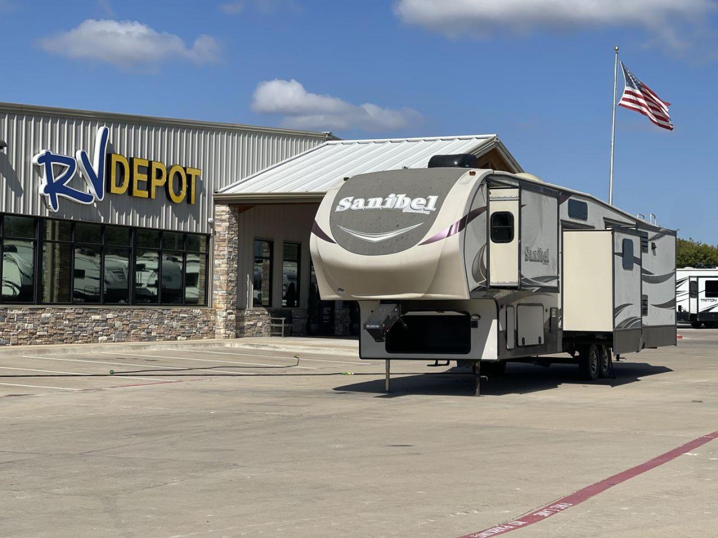 2015 FOREST RIVER SANIBEL 38QB (5ZT3SN3B4FG) , Length: 42.5 ft. | Dry Weight: 12,913 lbs. | Slides: 4 transmission, located at 4319 N Main Street, Cleburne, TX, 76033, (817) 221-0660, 32.435829, -97.384178 - The 2015 Prime Time Sanibel 38QB stands out with its spacious and functional design. It measures 42.5 feet in length and weighs 12,913 pounds. This fifth wheel features four slides that significantly expand the interior space. Its exterior showcases an aerodynamic front cap and stylish graphics. Ins - Photo#0