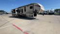 2015 FOREST RIVER SANIBEL 38QB (5ZT3SN3B4FG) , Length: 42.5 ft. | Dry Weight: 12,913 lbs. | Slides: 4 transmission, located at 4319 N Main Street, Cleburne, TX, 76033, (817) 221-0660, 32.435829, -97.384178 - The 2015 Prime Time Sanibel 38QB stands out with its spacious and functional design. It measures 42.5 feet in length and weighs 12,913 pounds. This fifth wheel features four slides that significantly expand the interior space. Its exterior showcases an aerodynamic front cap and stylish graphics. Ins - Photo#3