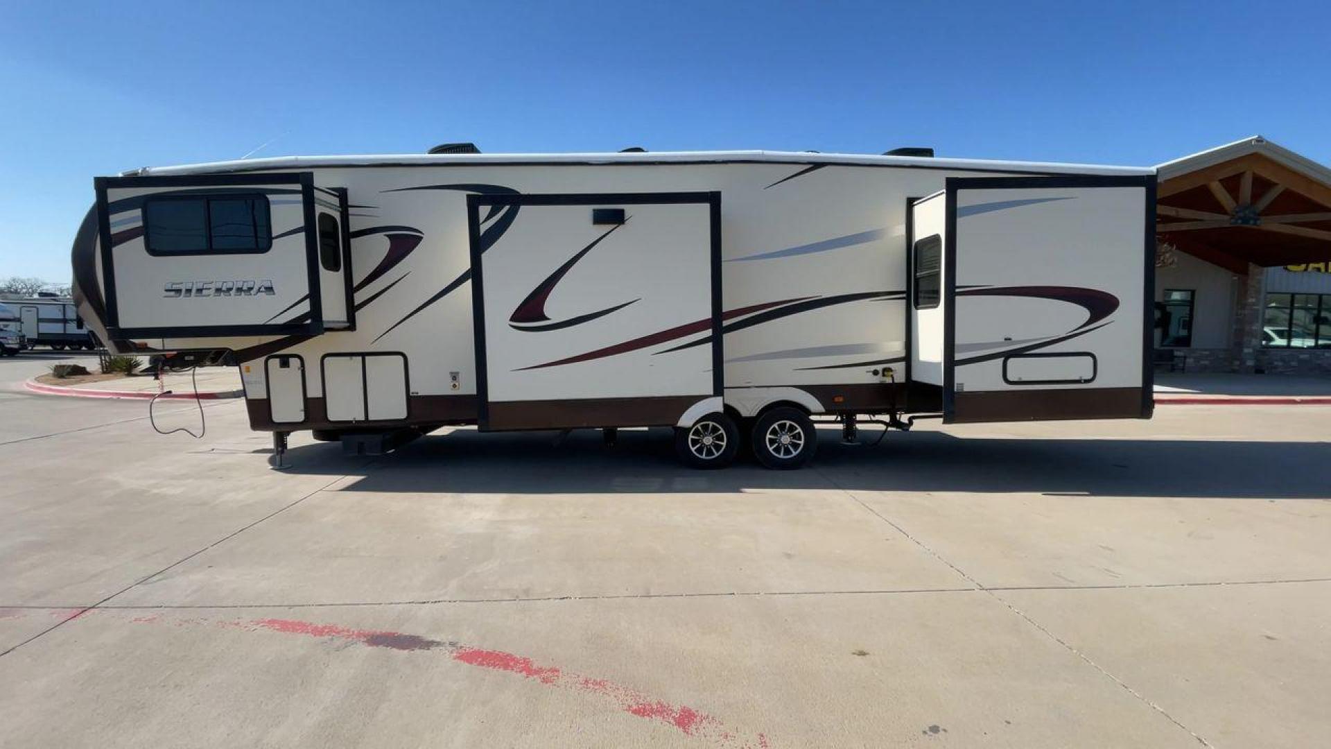 2015 TAN FOREST RIVER SIERRA 377FLIK (4X4FSEP20FJ) , Length: 41.67 ft. | Dry Weight: 11,821 lbs. | Gross Weight: 15,500 lbs. | Slides: 5 transmission, located at 4319 N Main Street, Cleburne, TX, 76033, (817) 221-0660, 32.435829, -97.384178 - The 2015 Forest River Sierra 377FLIK is a luxurious fifth wheel featuring a unique front living room design, high-end finishes, and spacious interiors. Perfect for full-time RVers or those who enjoy extended stays, this model offers a comfortable and stylish home away from home. The 377FLIK model co - Photo#6