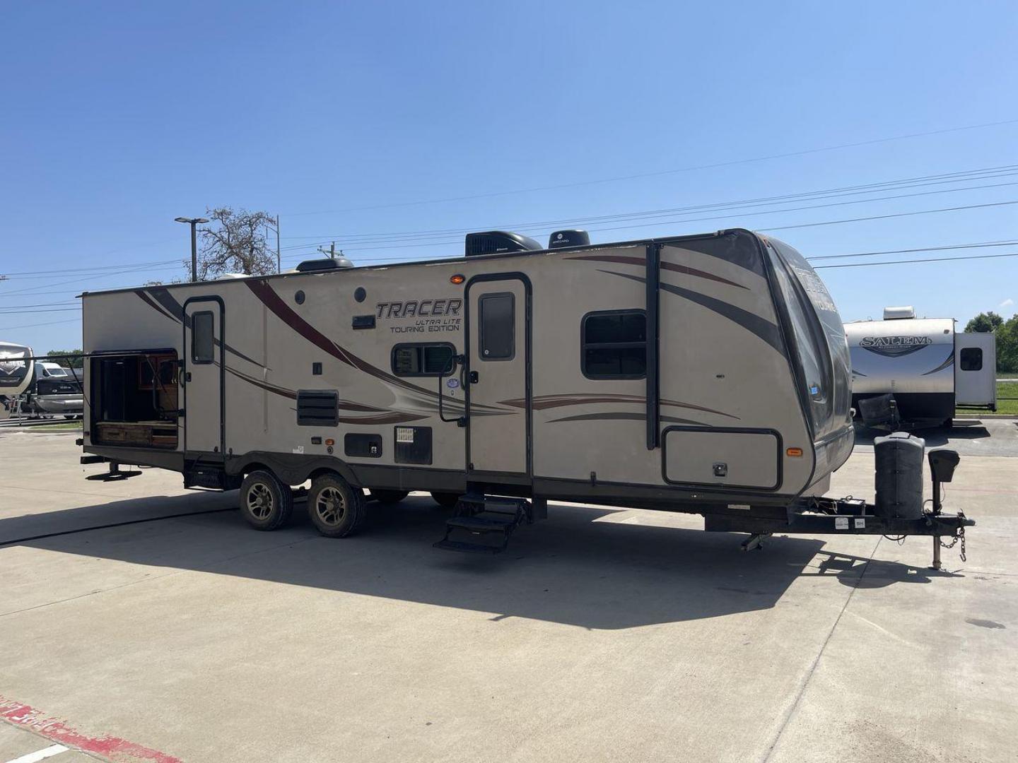 2015 WHITE FOREST RIVER TRACER 3150BHD (5ZT2TRXB5FB) , Length: 34 ft. | Dry Weight: 6,955 lbs. | Slides: 2 transmission, located at 4319 N Main Street, Cleburne, TX, 76033, (817) 221-0660, 32.435829, -97.384178 - In this 2015 Forest River Tracer 3150BHD, you are guaranteed more campers, more features, and more fun! This travel trailer measures exactly 34 ft. in length with a dry weight of 6,955 lbs. and a payload capacity of 2,755 lbs. It includes two doors, two slides, and one awning. This model featu - Photo#24