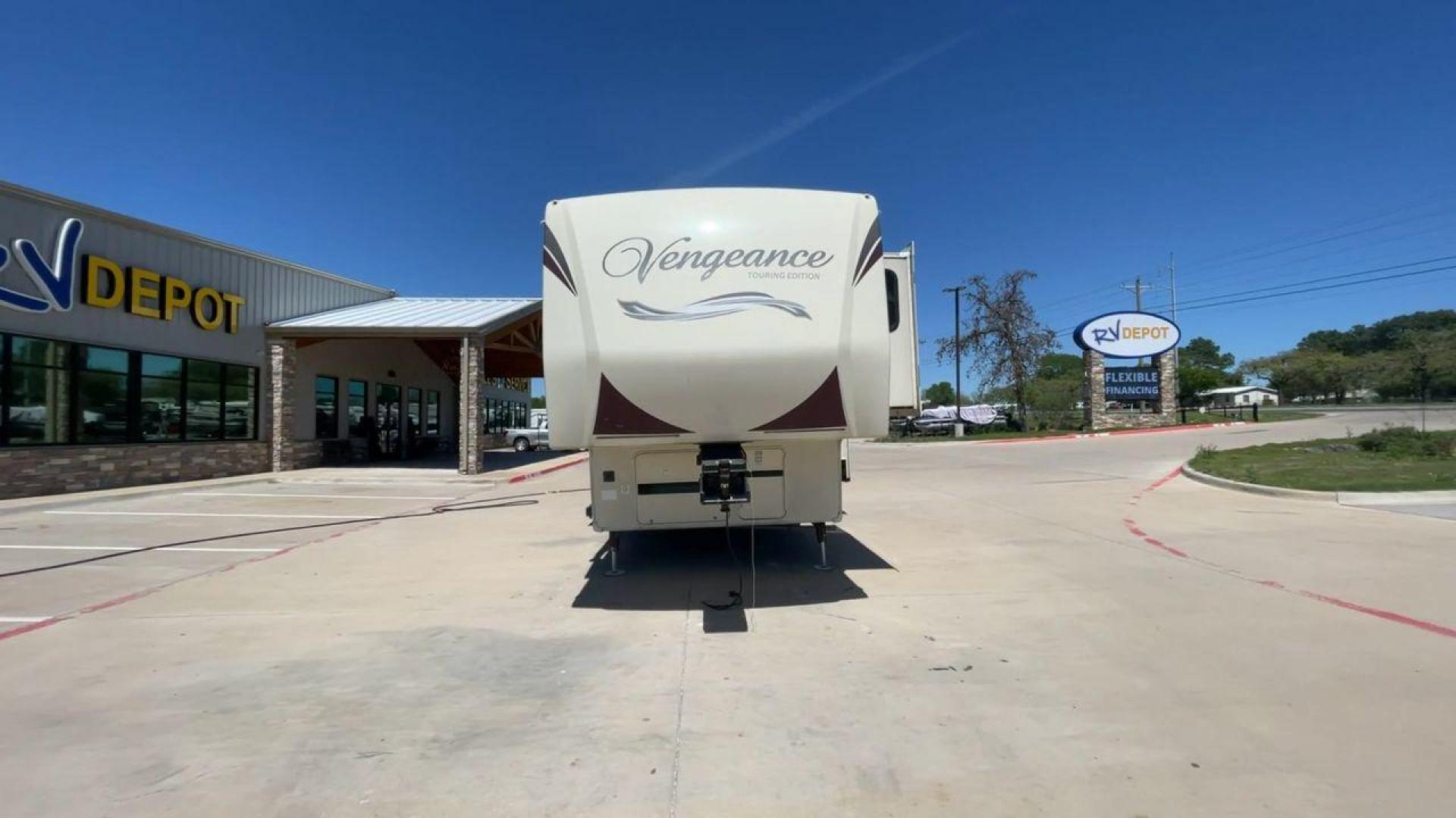 2015 TAN FOREST RIVER VENGEANCE - (4X4FVGR30FR) , Length: 42.83 ft. | Dry Weight: 14,270 lbs. | Gross Weight: 17,500 lbs. | Slides: 3 transmission, located at 4319 N Main Street, Cleburne, TX, 76033, (817) 221-0660, 32.435829, -97.384178 - Designed to provide comfort and adventure to your travels, the 2015 Forest River Vengeance 39B12 is a tough and adaptable fifth wheel toy hauler. With a dry weight of 14,270 pounds and a length of a little over 42 feet, this model offers plenty of room for your belongings while still being towable - Photo#4