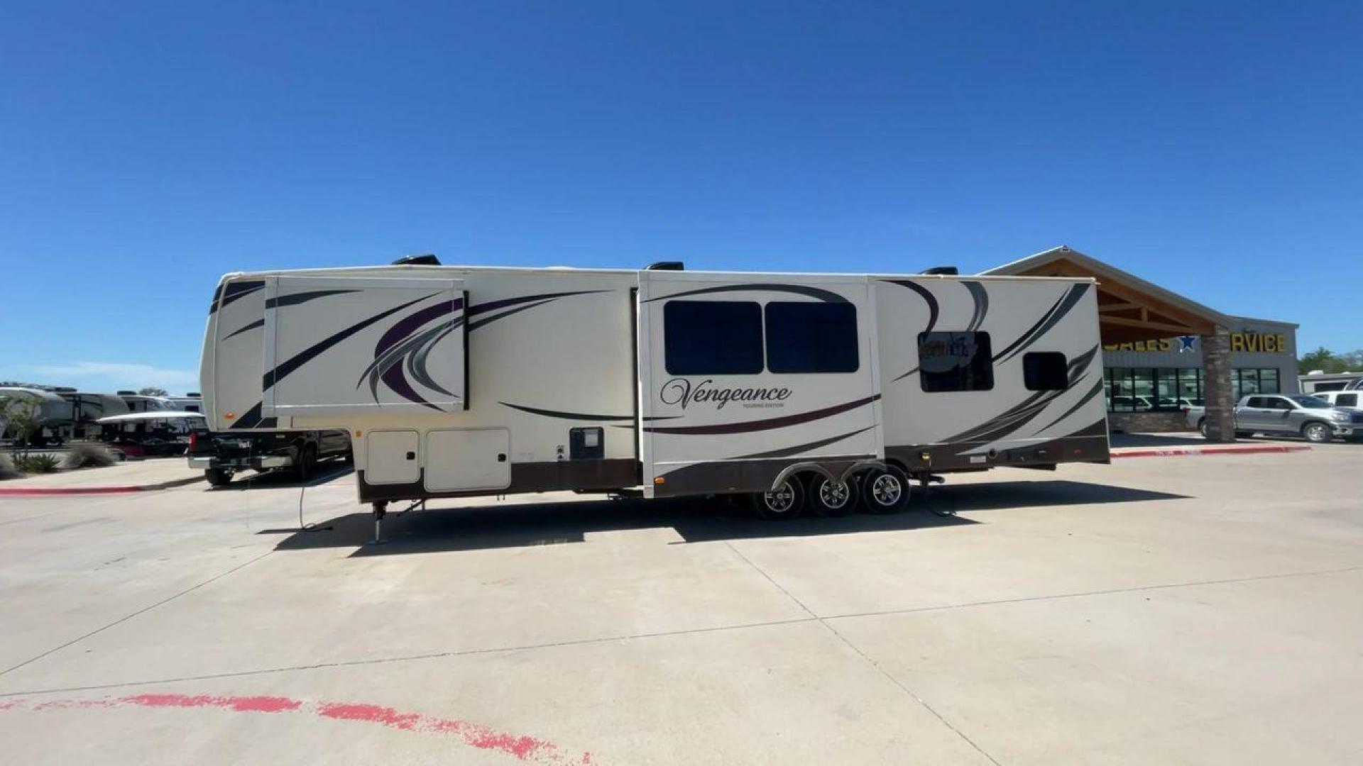 2015 TAN FOREST RIVER VENGEANCE - (4X4FVGR30FR) , Length: 42.83 ft. | Dry Weight: 14,270 lbs. | Gross Weight: 17,500 lbs. | Slides: 3 transmission, located at 4319 N Main Street, Cleburne, TX, 76033, (817) 221-0660, 32.435829, -97.384178 - Designed to provide comfort and adventure to your travels, the 2015 Forest River Vengeance 39B12 is a tough and adaptable fifth wheel toy hauler. With a dry weight of 14,270 pounds and a length of a little over 42 feet, this model offers plenty of room for your belongings while still being towable - Photo#6