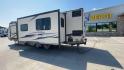 2015 TAN FREEDOM EXPRESS 305RKDS (5ZT2FEWB1FA) , Length: 34.5 ft. | Dry Weight: 6,199 lbs | Gross Weight: 9,500 lbs. | Slides: 2 transmission, located at 4319 N Main Street, Cleburne, TX, 76033, (817) 221-0660, 32.435829, -97.384178 - The 2015 Freedom Express 305RKDS is a travel trailer designed to deliver an exceptional camping experience, combining freedom and comfort in every detail. It boasts a rear kitchen layout, providing a unique and functional living space. The rear kitchen is equipped with high-end appliances, ample cou - Photo#7