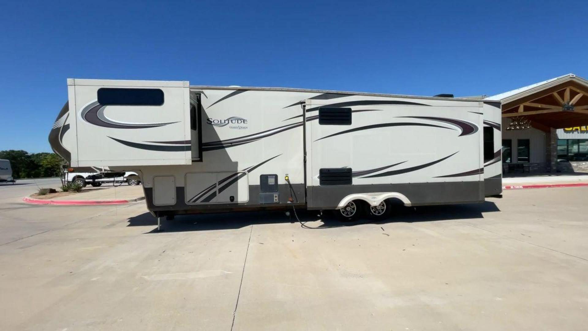 2015 GRAND DESIGN SOLITUDE 369RL (573FS3820F1) , Length: 38.92 ft. | Dry Weight: 12,650 lbs. | Gross Weight: 16,000 lbs. | Slides: 3 transmission, located at 4319 N Main Street, Cleburne, TX, 76033, (817) 221-0660, 32.435829, -97.384178 - Photo#6