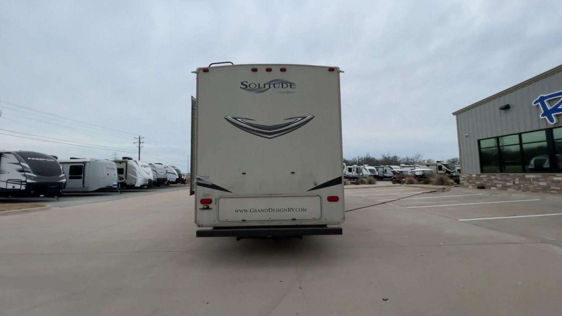 2015 BEIGE GRAND DESIGN SOLITUDE 379FL (573FS4325F1) , Length: 42.5 ft. | Dry Weight: 13,800 lbs. | Gross Weight: 16,000 lbs. | Slides: 5 transmission, located at 4319 N Main Street, Cleburne, TX, 76033, (817) 221-0660, 32.435829, -97.384178 - This 2015 GRSL Solitude 379 fifth wheel measures just over 42' in length. It is a dual axle and aluminum wheel setup with a GCWR of 16,000 lbs and a carrying capacity of 2,200 lbs. With five slides, this fifth wheel is spacious and comfortable! The Solitude's exterior is made from fiberglass, finish - Photo#8