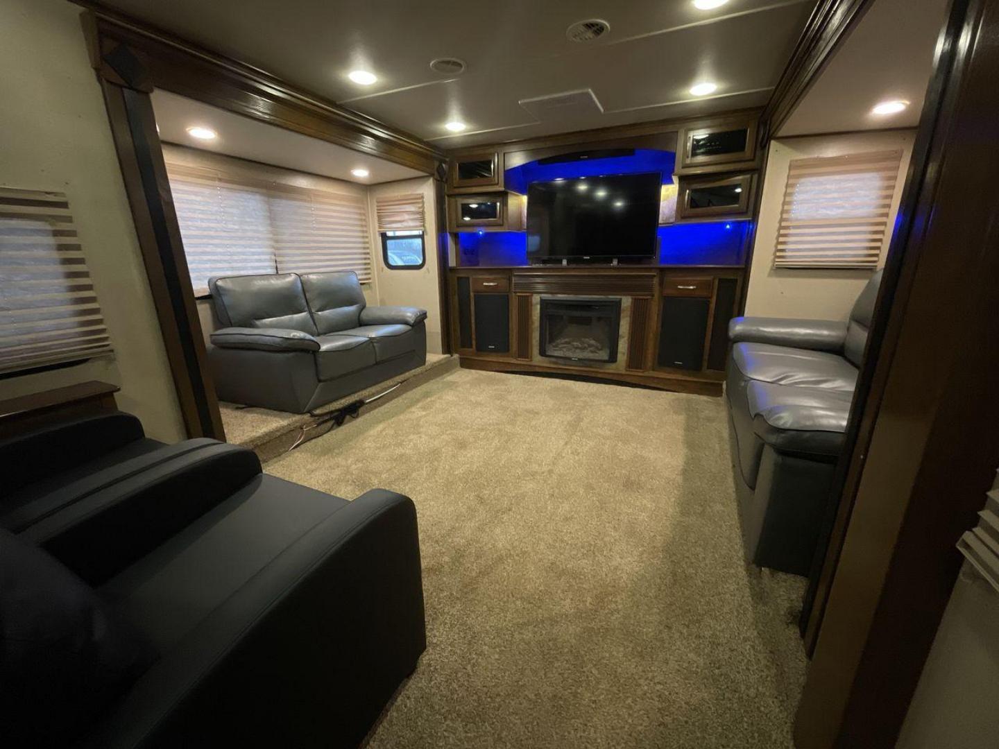 2015 BEIGE GRAND DESIGN SOLITUDE 379FL (573FS4325F1) , Length: 42.5 ft. | Dry Weight: 13,800 lbs. | Gross Weight: 16,000 lbs. | Slides: 5 transmission, located at 4319 N Main Street, Cleburne, TX, 76033, (817) 221-0660, 32.435829, -97.384178 - This 2015 GRSL Solitude 379 fifth wheel measures just over 42' in length. It is a dual axle and aluminum wheel setup with a GCWR of 16,000 lbs and a carrying capacity of 2,200 lbs. With five slides, this fifth wheel is spacious and comfortable! The Solitude's exterior is made from fiberglass, finish - Photo#10