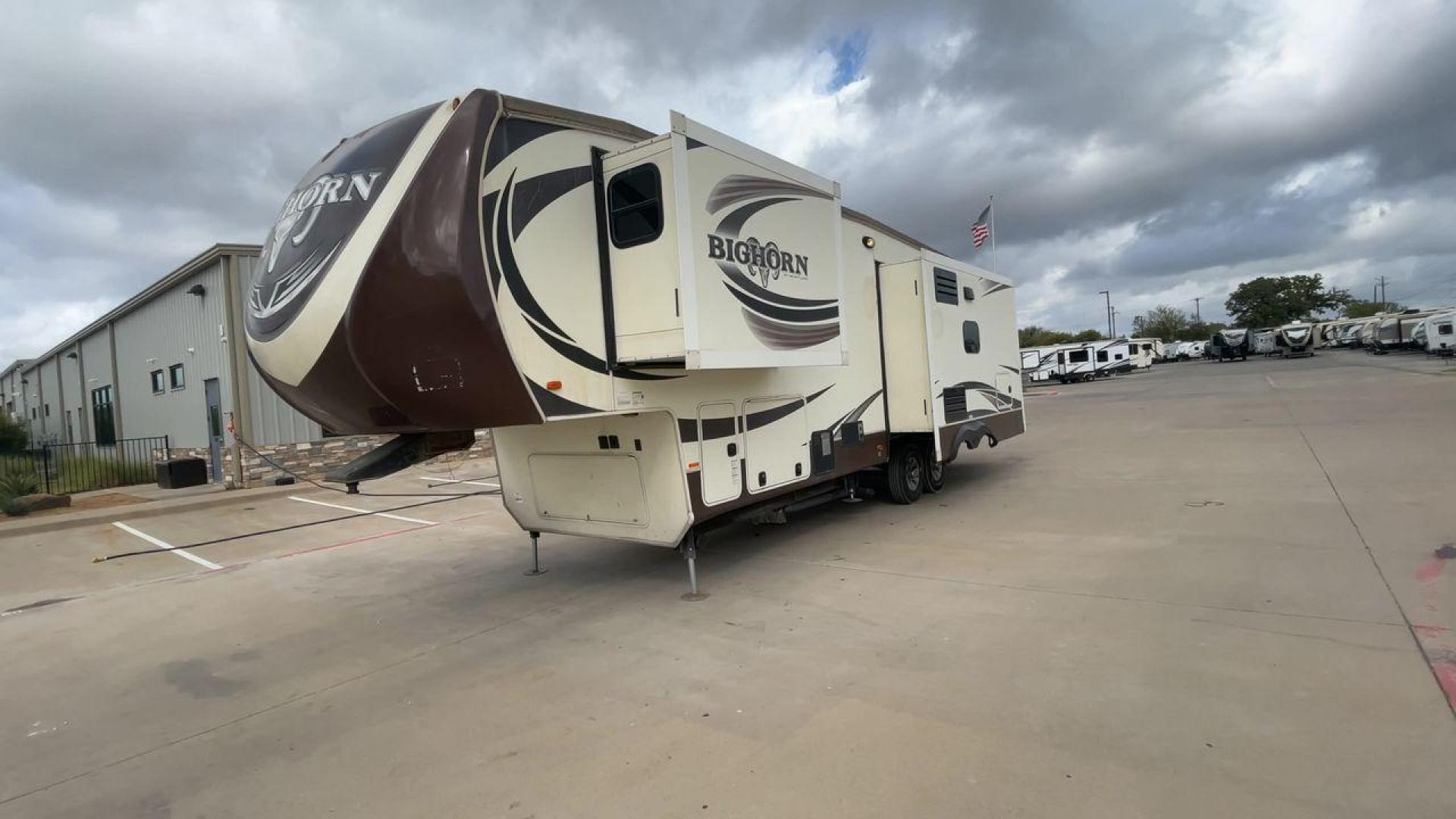 2015 HEARTLAND BIGHORN 3270RS (5SFBG3521FE) , Length: 36.6 ft. | Gross Weight: 15,500 lbs. | Slides: 3 transmission, located at 4319 N Main Street, Cleburne, TX, 76033, (817) 221-0660, 32.435829, -97.384178 - The 2015 Heartland Bighorn 3270RS is a luxurious fifth wheel designed for comfort and quality, ideal for couples or small families seeking an upscale, spacious RV with residential-style amenities. This model is perfect for extended stays, featuring high-end finishes and an open floor plan. The dimen - Photo#5