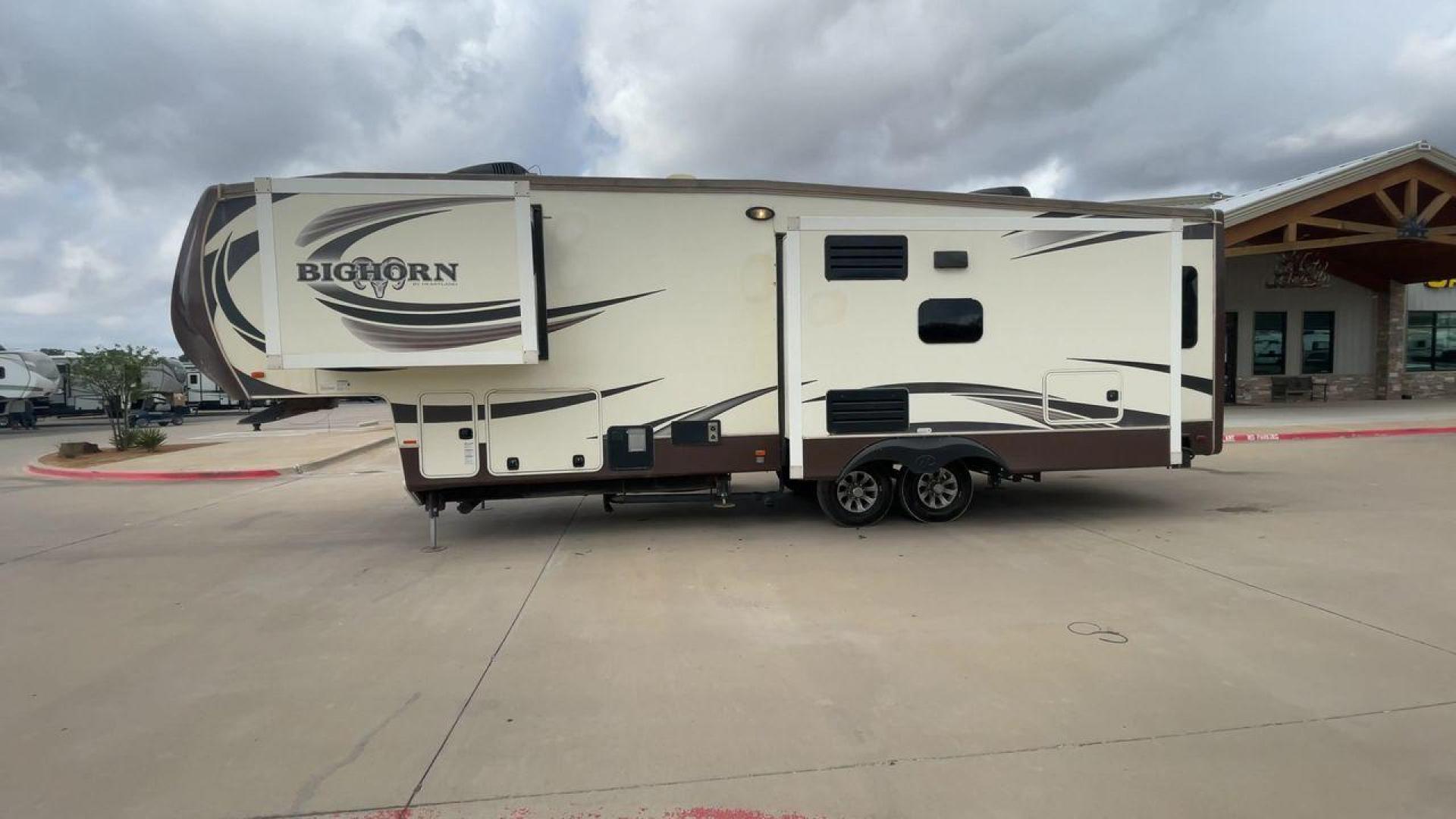 2015 HEARTLAND BIGHORN 3270RS (5SFBG3521FE) , Length: 36.6 ft. | Gross Weight: 15,500 lbs. | Slides: 3 transmission, located at 4319 N Main Street, Cleburne, TX, 76033, (817) 221-0660, 32.435829, -97.384178 - The 2015 Heartland Bighorn 3270RS is a luxurious fifth wheel designed for comfort and quality, ideal for couples or small families seeking an upscale, spacious RV with residential-style amenities. This model is perfect for extended stays, featuring high-end finishes and an open floor plan. The dimen - Photo#6