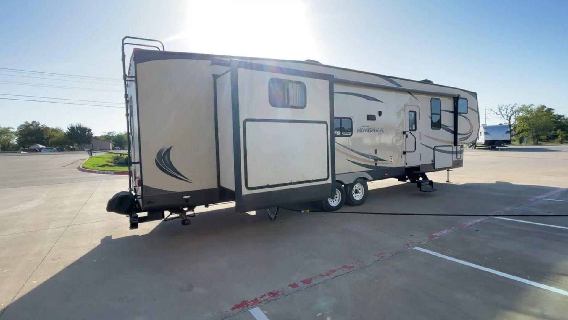 2015 TAN HEMISPHERE 356QB - (4X4FSBM29FU) , Length: 42.25 ft. | Dry Weight: 10,960 lbs. | Slides: 4 transmission, located at 4319 N Main Street, Cleburne, TX, 76033, (817) 221-0660, 32.435829, -97.384178 - This 2015 Hemisphere 356QB by Forest River fifth wheel is ideal for a large family with its quad slides and rear bunkhouse suite. The dimensions measure approximately 42.25 ft in length by 13.17 ft in height. It has a dry weight of 10,960 lbs, a payload capacity of 2,541 lbs, and a hitch weight of 1 - Photo#1