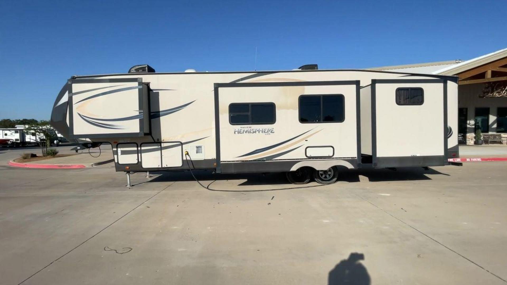 2015 TAN HEMISPHERE 356QB - (4X4FSBM29FU) , Length: 42.25 ft. | Dry Weight: 10,960 lbs. | Slides: 4 transmission, located at 4319 N Main Street, Cleburne, TX, 76033, (817) 221-0660, 32.435829, -97.384178 - This 2015 Hemisphere 356QB by Forest River fifth wheel is ideal for a large family with its quad slides and rear bunkhouse suite. The dimensions measure approximately 42.25 ft in length by 13.17 ft in height. It has a dry weight of 10,960 lbs, a payload capacity of 2,541 lbs, and a hitch weight of 1 - Photo#6