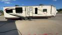 2015 BEIGE JAYCO EAGLE 338RETS - (1UJBJ0BU6F1) , Length: 39.2 ft. | Dry Weight: 8,710 lbs. | Gross Weight: 10,950 lbs. | Slides: 3 transmission, located at 4319 N Main Street, Cleburne, TX, 76033, (817) 221-0660, 32.435829, -97.384178 - This 2015 Jayco Eagle 338RETS travel trailer measures just under 40' in length. It is a dual axle, aluminum wheel setup with a GVWR of 10,950 lbs and has a carrying capacity of 2,240 lbs. With three slides, this travel trailer is open and spacious!Constructed with an aluminum body and featuring fibe - Photo#2