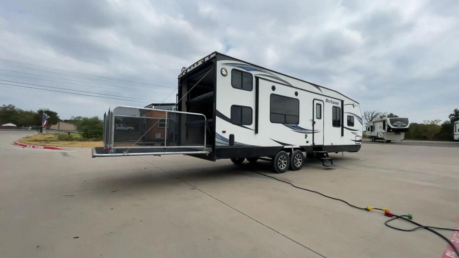 2015 JAYCO OCTANE 31B (1UJBJSBR8F1) , Length: 33.58 ft. | Dry Weight: 6,805 lbs. | Gross Weight: 11,950 lbs. | Slides: 0 transmission, located at 4319 N Main Street, Cleburne, TX, 76033, (817) 221-0660, 32.435829, -97.384178 - Photo#1