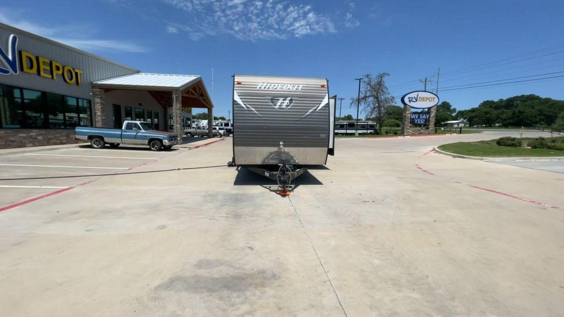 2015 KEYSTONE HIDEOUT 38BHDS (4YDT38B21F7) , Length: 39.83 ft. | Dry Weight: 8,420 lbs. | Gross Weight: 10,010 lbs. | Slides: 2 transmission, located at 4319 N Main Street, Cleburne, TX, 76033, (817) 221-0660, 32.435829, -97.384178 - Measuring 39.83 feet in length and boasting a dry weight of 8,420 lbs, the Hideout is both spacious and lightweight, making it easy to tow and maneuver. With a gross weight of 10,010 lbs, you'll have plenty of room for all your gear and supplies. With a wood body and aluminum sides, this trailer is - Photo#4