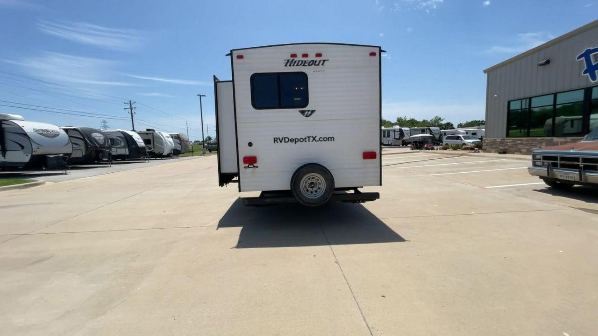 2015 KEYSTONE HIDEOUT 38BHDS (4YDT38B21F7) , Length: 39.83 ft. | Dry Weight: 8,420 lbs. | Gross Weight: 10,010 lbs. | Slides: 2 transmission, located at 4319 N Main Street, Cleburne, TX, 76033, (817) 221-0660, 32.435829, -97.384178 - Measuring 39.83 feet in length and boasting a dry weight of 8,420 lbs, the Hideout is both spacious and lightweight, making it easy to tow and maneuver. With a gross weight of 10,010 lbs, you'll have plenty of room for all your gear and supplies. With a wood body and aluminum sides, this trailer is - Photo#8