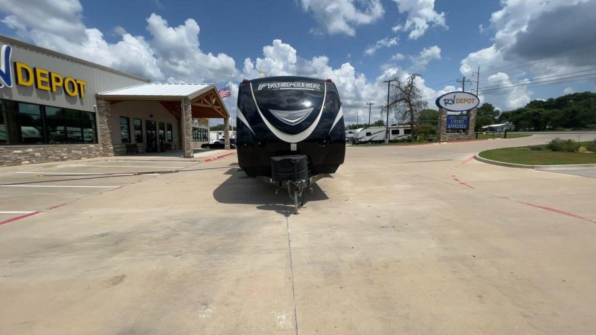 2015 TAN KEYSTONE PREMIER 34BHPR (4YDT34B25FD) , Length: 37 ft. | Dry Weight: 7,076 lbs. | Gross Weight: 8,800 lbs. | Slides: 3 transmission, located at 4319 N Main Street, Cleburne, TX, 76033, (817) 221-0660, 32.435829, -97.384178 - Take a trip with more family members and friends in this remarkably spacious 2015 Keystone Premier 34BHPR! This travel trailer measures exactly 37 ft. in length and 10.92 ft. in height. It has a dry weight of 7,076 lbs. and a GVWR of 8,800 lbs. It highlights a rear bunk and an outside kitchen, ma - Photo#4