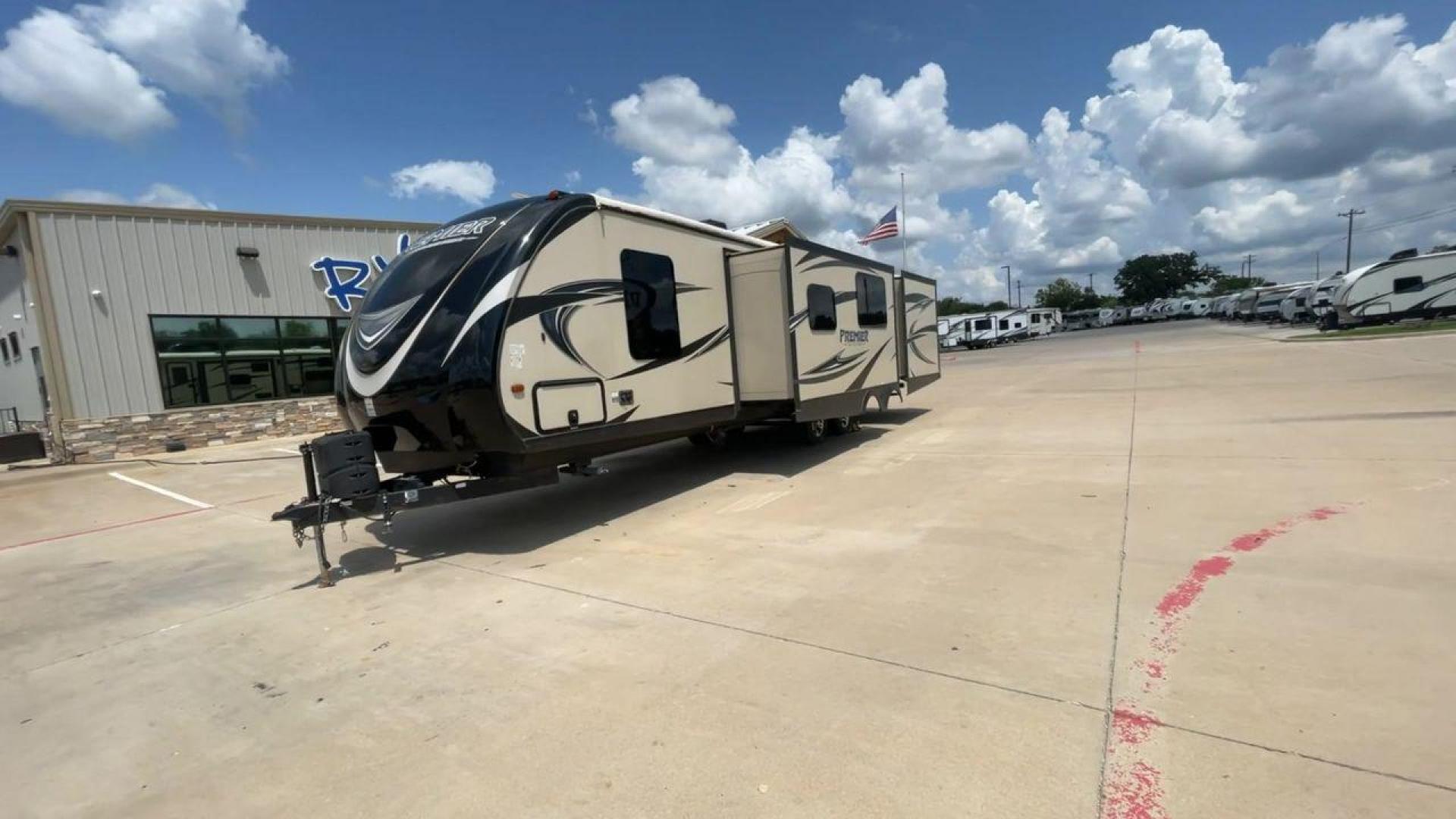 2015 TAN KEYSTONE PREMIER 34BHPR (4YDT34B25FD) , Length: 37 ft. | Dry Weight: 7,076 lbs. | Gross Weight: 8,800 lbs. | Slides: 3 transmission, located at 4319 N Main Street, Cleburne, TX, 76033, (817) 221-0660, 32.435829, -97.384178 - Take a trip with more family members and friends in this remarkably spacious 2015 Keystone Premier 34BHPR! This travel trailer measures exactly 37 ft. in length and 10.92 ft. in height. It has a dry weight of 7,076 lbs. and a GVWR of 8,800 lbs. It highlights a rear bunk and an outside kitchen, ma - Photo#5