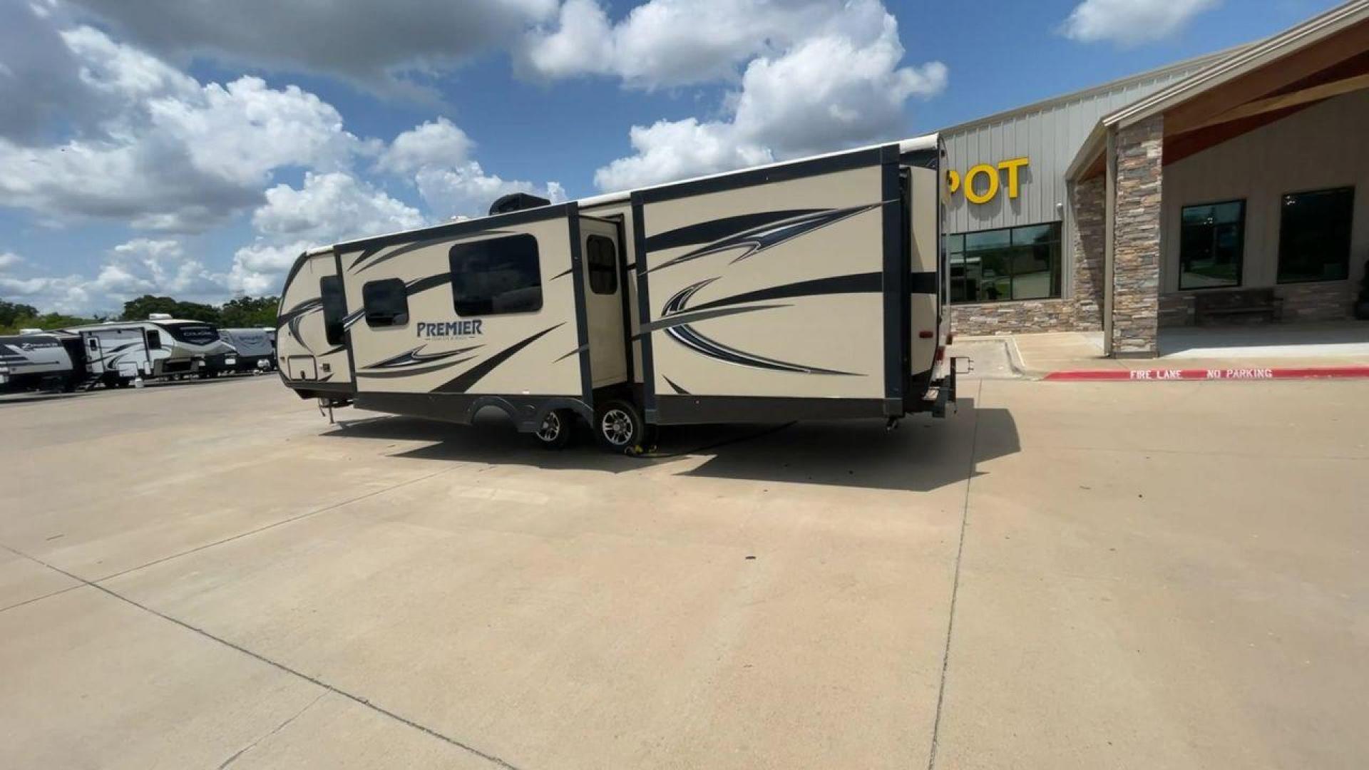 2015 TAN KEYSTONE PREMIER 34BHPR (4YDT34B25FD) , Length: 37 ft. | Dry Weight: 7,076 lbs. | Gross Weight: 8,800 lbs. | Slides: 3 transmission, located at 4319 N Main Street, Cleburne, TX, 76033, (817) 221-0660, 32.435829, -97.384178 - Take a trip with more family members and friends in this remarkably spacious 2015 Keystone Premier 34BHPR! This travel trailer measures exactly 37 ft. in length and 10.92 ft. in height. It has a dry weight of 7,076 lbs. and a GVWR of 8,800 lbs. It highlights a rear bunk and an outside kitchen, ma - Photo#7