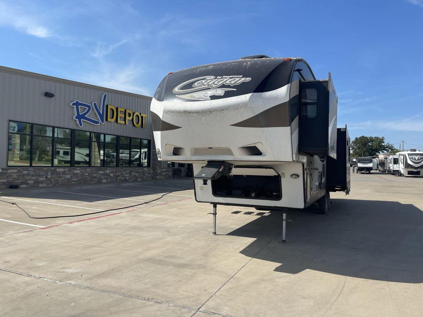 2015 KEYSTONE RV COUGAR 327RES (4YDF32729F2) , Length: 36.42 ft. | Dry Weight: 10,213 lbs. | Gross Weight: 12,135 lbs. | Slides: 3 transmission, located at 4319 N Main Street, Cleburne, TX, 76033, (817) 221-0660, 32.435829, -97.384178 - Enjoy the abundant storage and space that comes with the 2015 Keystone Cougar 327RES! This fifth wheel measures 36.42 ft. in length and 12.25 ft. in height. It has a dry weight of 10,213 lbs. and a GVWR of 12,135 lbs. It also comes equipped with automatic heating and cooling rated at 30,000 and 1 - Photo#0