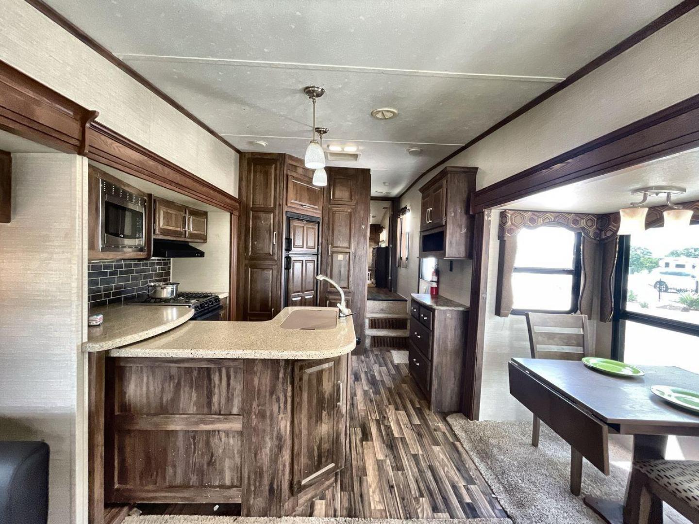 2015 KEYSTONE RV COUGAR 327RES (4YDF32729F2) , Length: 36.42 ft. | Dry Weight: 10,213 lbs. | Gross Weight: 12,135 lbs. | Slides: 3 transmission, located at 4319 N Main Street, Cleburne, TX, 76033, (817) 221-0660, 32.435829, -97.384178 - Enjoy the abundant storage and space that comes with the 2015 Keystone Cougar 327RES! This fifth wheel measures 36.42 ft. in length and 12.25 ft. in height. It has a dry weight of 10,213 lbs. and a GVWR of 12,135 lbs. It also comes equipped with automatic heating and cooling rated at 30,000 and 1 - Photo#12