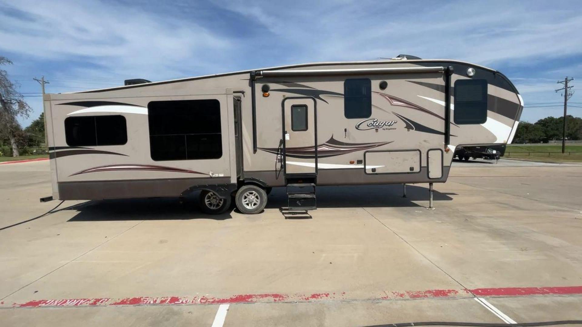 2015 KEYSTONE RV COUGAR 327RES (4YDF32729F2) , Length: 36.42 ft. | Dry Weight: 10,213 lbs. | Gross Weight: 12,135 lbs. | Slides: 3 transmission, located at 4319 N Main Street, Cleburne, TX, 76033, (817) 221-0660, 32.435829, -97.384178 - Enjoy the abundant storage and space that comes with the 2015 Keystone Cougar 327RES! This fifth wheel measures 36.42 ft. in length and 12.25 ft. in height. It has a dry weight of 10,213 lbs. and a GVWR of 12,135 lbs. It also comes equipped with automatic heating and cooling rated at 30,000 and 1 - Photo#2