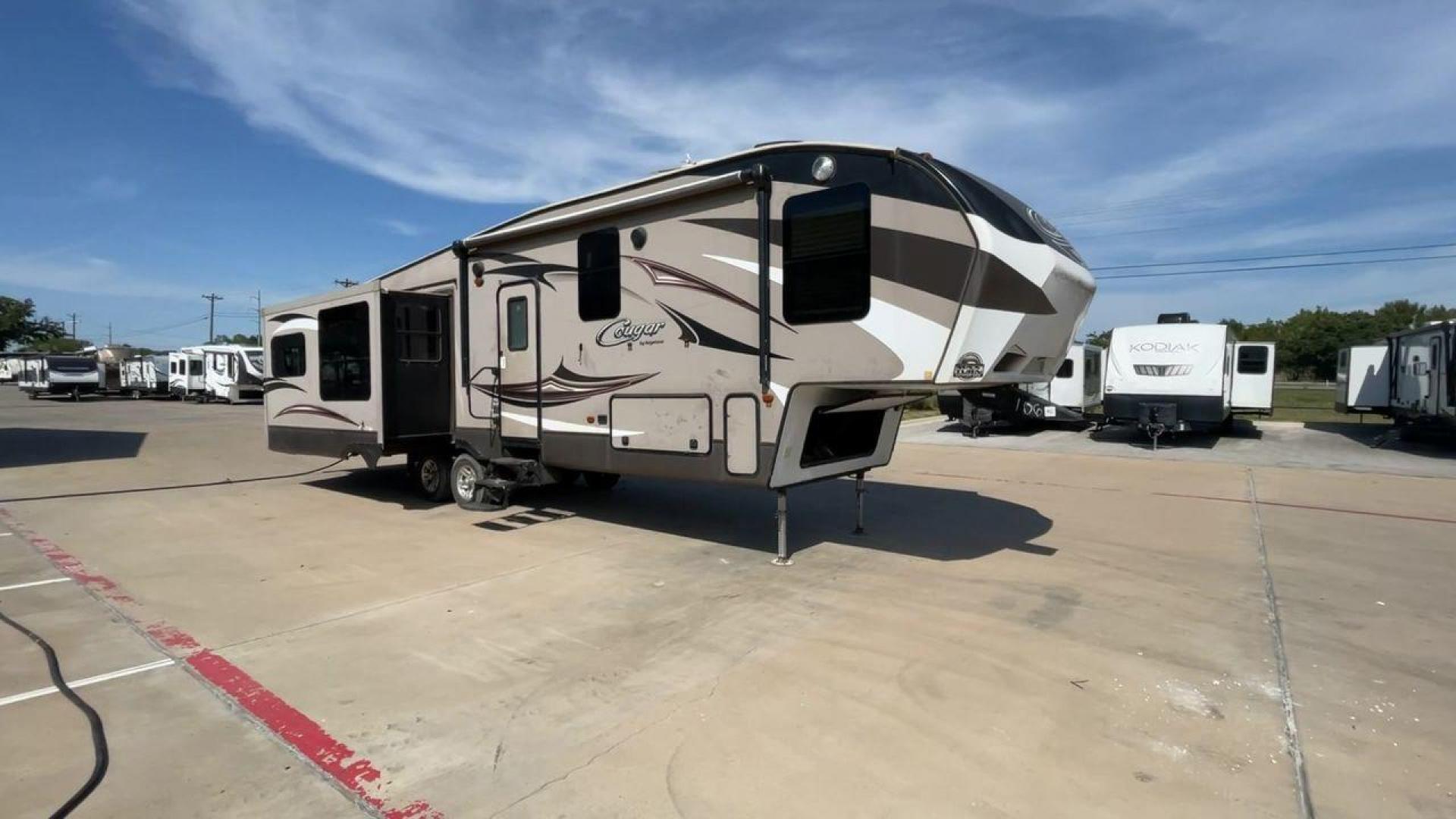 2015 KEYSTONE RV COUGAR 327RES (4YDF32729F2) , Length: 36.42 ft. | Dry Weight: 10,213 lbs. | Gross Weight: 12,135 lbs. | Slides: 3 transmission, located at 4319 N Main Street, Cleburne, TX, 76033, (817) 221-0660, 32.435829, -97.384178 - Enjoy the abundant storage and space that comes with the 2015 Keystone Cougar 327RES! This fifth wheel measures 36.42 ft. in length and 12.25 ft. in height. It has a dry weight of 10,213 lbs. and a GVWR of 12,135 lbs. It also comes equipped with automatic heating and cooling rated at 30,000 and 1 - Photo#3