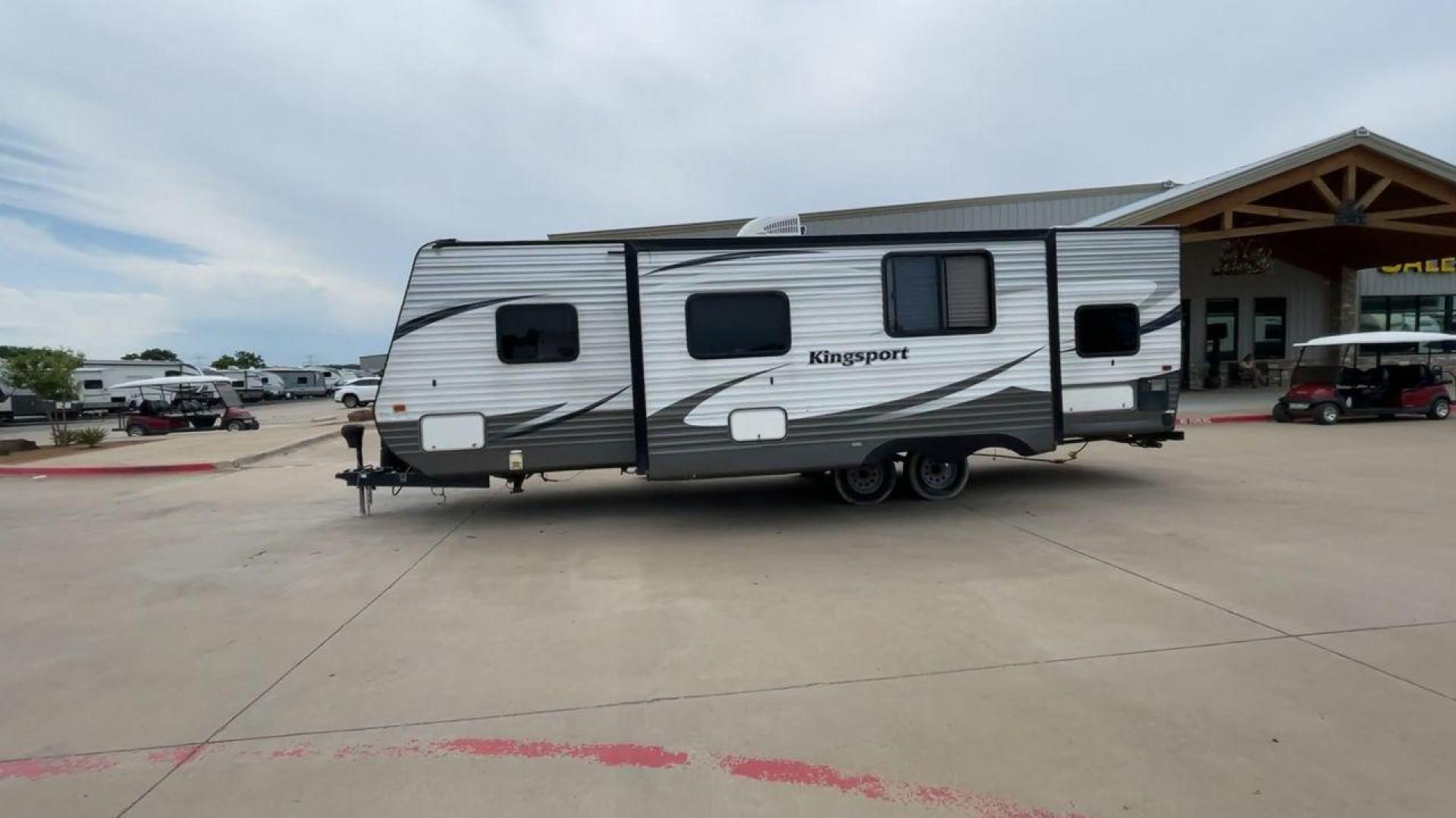 2015 WHITE KINGSPORT 277DDS - (1NL1GTM22F1) , Length: 31.17 ft. | Dry Weight: 6,620 lbs. | Slides: 1 transmission, located at 4319 N Main Street, Cleburne, TX, 76033, (817) 221-0660, 32.435829, -97.384178 - This 2015 Kingsport 277DDS measures 31.17 ft. in length and 10.75 ft. in height. It has a dry weight of 6,620 lbs. with a payload capacity of 1,520 lbs. and a hitch weight of 958 lbs. It includes two doors, one slide, and one awning. This travel trailer offers sleeping space for up to 10 people w - Photo#6