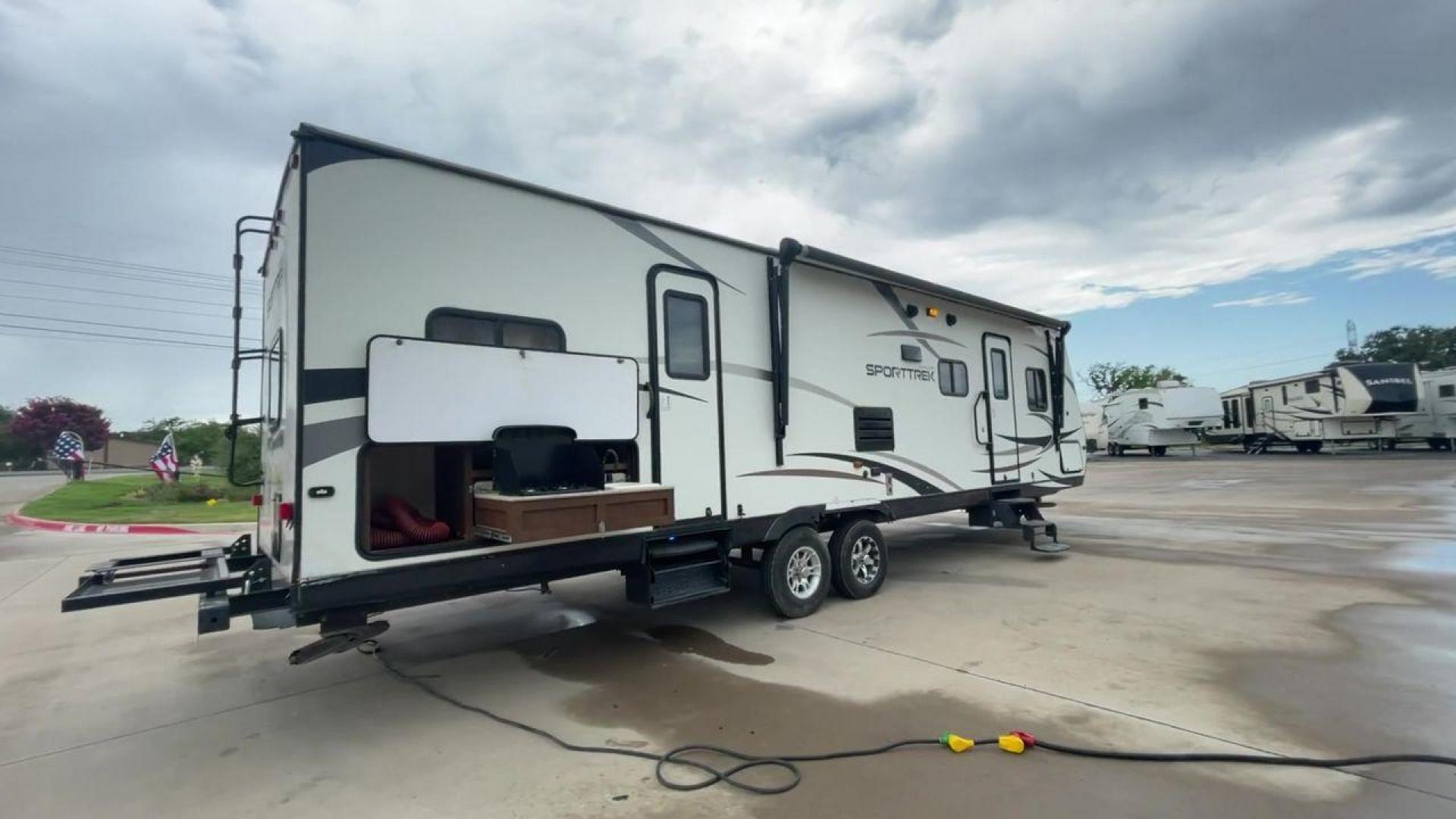 2015 WHITE KZ VENTURE RV SPORTTREK (4EZT13128F5) , Length: 35.6 ft | Dry Weight: 7,110 lbs | Gross Weight: 8,300 lbs | Slides: 2 transmission, located at 4319 N Main Street, Cleburne, TX, 76033, (817) 221-0660, 32.435829, -97.384178 - With the 2015 KZ Venture RV SportTrek Travel Trailer, set out on your next adventure. With the modern traveler in mind, this travel trailer offers the ideal balance of comfort, style, and functionality. This unit measures 35.5 ft in length, 8 ft in width, and 10.92 ft in height. It has a dry weig - Photo#1