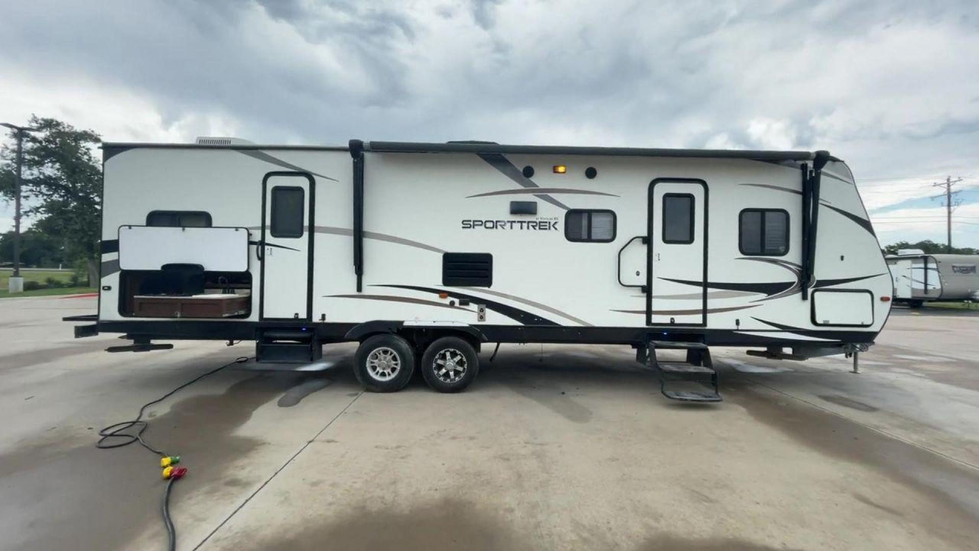 2015 WHITE KZ VENTURE RV SPORTTREK (4EZT13128F5) , Length: 35.6 ft | Dry Weight: 7,110 lbs | Gross Weight: 8,300 lbs | Slides: 2 transmission, located at 4319 N Main Street, Cleburne, TX, 76033, (817) 221-0660, 32.435829, -97.384178 - With the 2015 KZ Venture RV SportTrek Travel Trailer, set out on your next adventure. With the modern traveler in mind, this travel trailer offers the ideal balance of comfort, style, and functionality. This unit measures 35.5 ft in length, 8 ft in width, and 10.92 ft in height. It has a dry weig - Photo#2