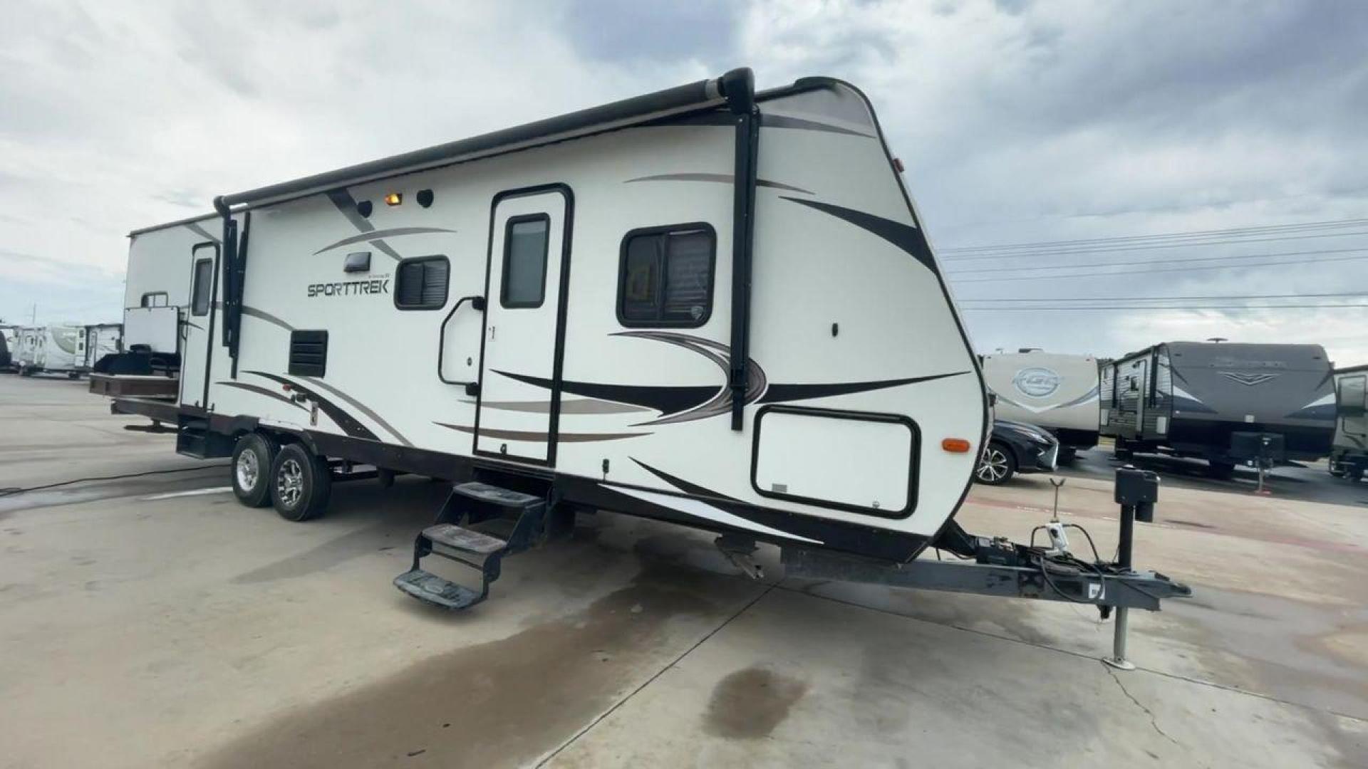 2015 WHITE KZ VENTURE RV SPORTTREK (4EZT13128F5) , Length: 35.6 ft | Dry Weight: 7,110 lbs | Gross Weight: 8,300 lbs | Slides: 2 transmission, located at 4319 N Main Street, Cleburne, TX, 76033, (817) 221-0660, 32.435829, -97.384178 - With the 2015 KZ Venture RV SportTrek Travel Trailer, set out on your next adventure. With the modern traveler in mind, this travel trailer offers the ideal balance of comfort, style, and functionality. This unit measures 35.5 ft in length, 8 ft in width, and 10.92 ft in height. It has a dry weig - Photo#3