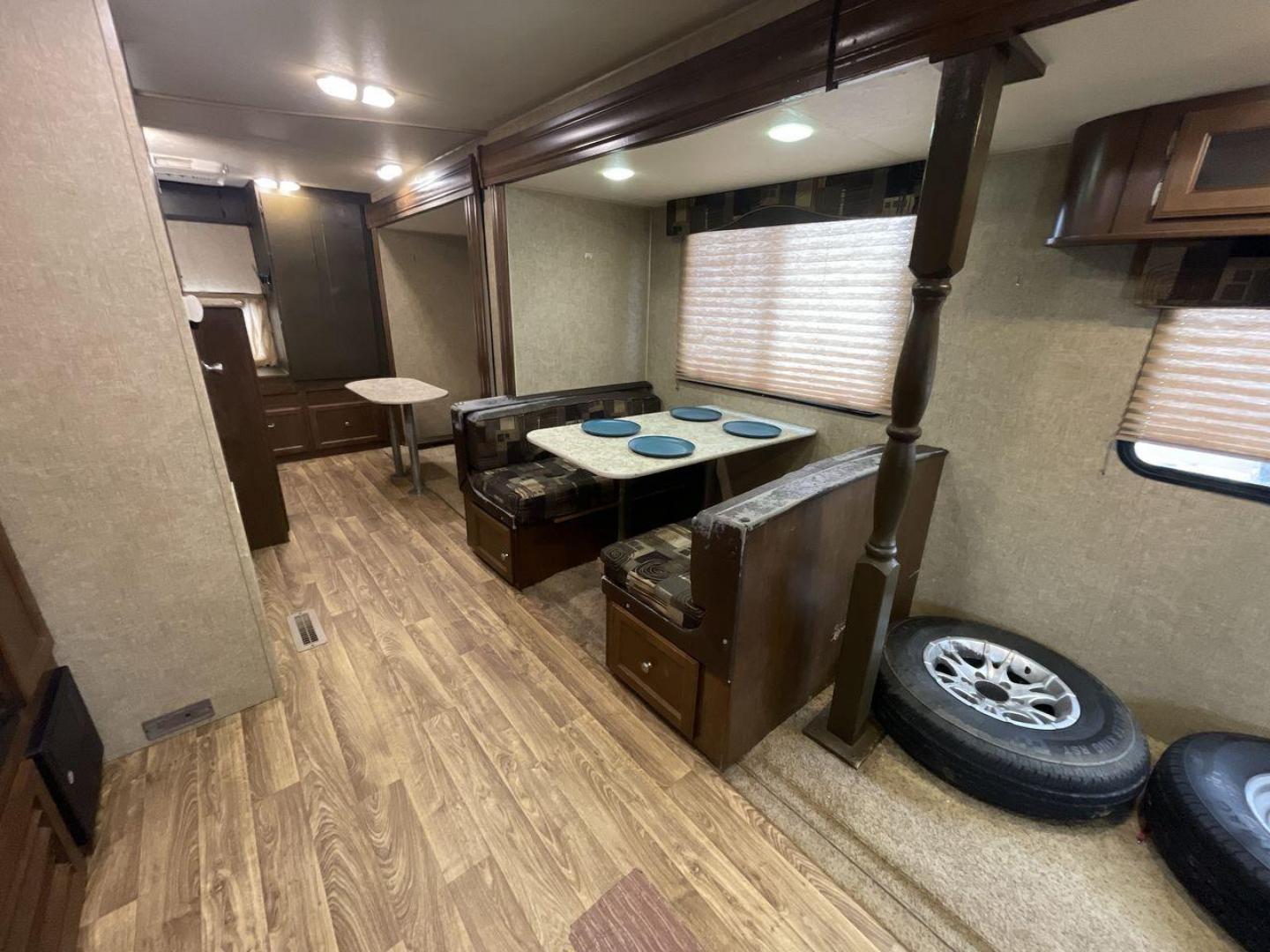 2015 WHITE KZ VENTURE RV SPORTTREK (4EZT13128F5) , Length: 35.6 ft | Dry Weight: 7,110 lbs | Gross Weight: 8,300 lbs | Slides: 2 transmission, located at 4319 N Main Street, Cleburne, TX, 76033, (817) 221-0660, 32.435829, -97.384178 - With the 2015 KZ Venture RV SportTrek Travel Trailer, set out on your next adventure. With the modern traveler in mind, this travel trailer offers the ideal balance of comfort, style, and functionality. This unit measures 35.5 ft in length, 8 ft in width, and 10.92 ft in height. It has a dry weig - Photo#13