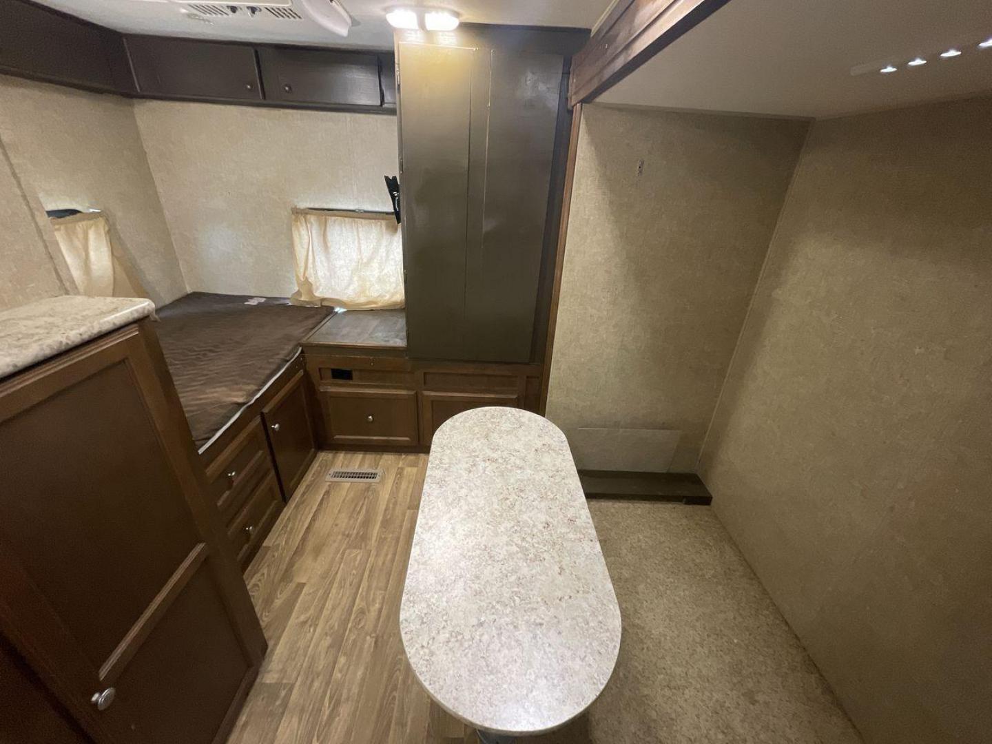 2015 WHITE KZ VENTURE RV SPORTTREK (4EZT13128F5) , Length: 35.6 ft | Dry Weight: 7,110 lbs | Gross Weight: 8,300 lbs | Slides: 2 transmission, located at 4319 N Main Street, Cleburne, TX, 76033, (817) 221-0660, 32.435829, -97.384178 - With the 2015 KZ Venture RV SportTrek Travel Trailer, set out on your next adventure. With the modern traveler in mind, this travel trailer offers the ideal balance of comfort, style, and functionality. This unit measures 35.5 ft in length, 8 ft in width, and 10.92 ft in height. It has a dry weig - Photo#19