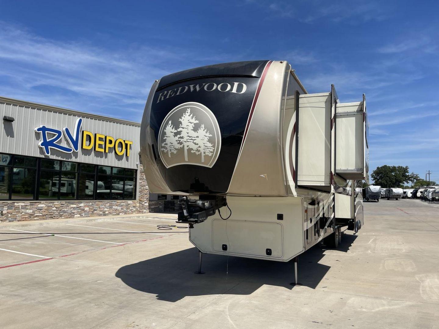 2015 REDWOOD 38RL (4V0FC3823FR) , Length: 41.42 ft. | Dry Weight: 13,672 lbs. | Gross Weight: 16,500 lbs. | Slides: 3 transmission, located at 4319 N Main Street, Cleburne, TX, 76033, (817) 221-0660, 32.435829, -97.384178 - The 2015 Redwood 38RL is a stunning fifth wheel that offers luxury, comfort, and spacious living. With an overall length of 41.42 feet and a dry weight of 13,672 lbs, this unit is built for those seeking an upscale RVing experience. The exterior features a sleek and modern design with bold maroon an - Photo#0